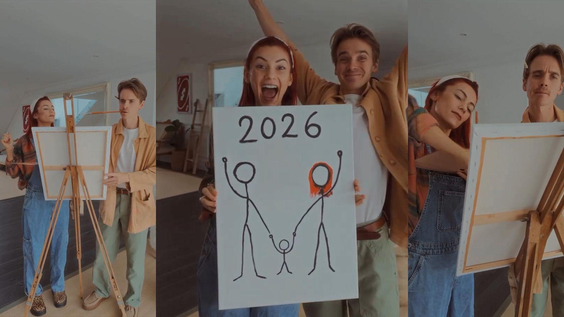 Three images taken from an Instagram video. In the middle, Dianne Buswell stands holding a canvas of two stick figures holding hands with a baby stick figure. Joe stands behind her his his arms up in celebration. On either side of this image are screenshots of Joe and Dianne painting the picture.