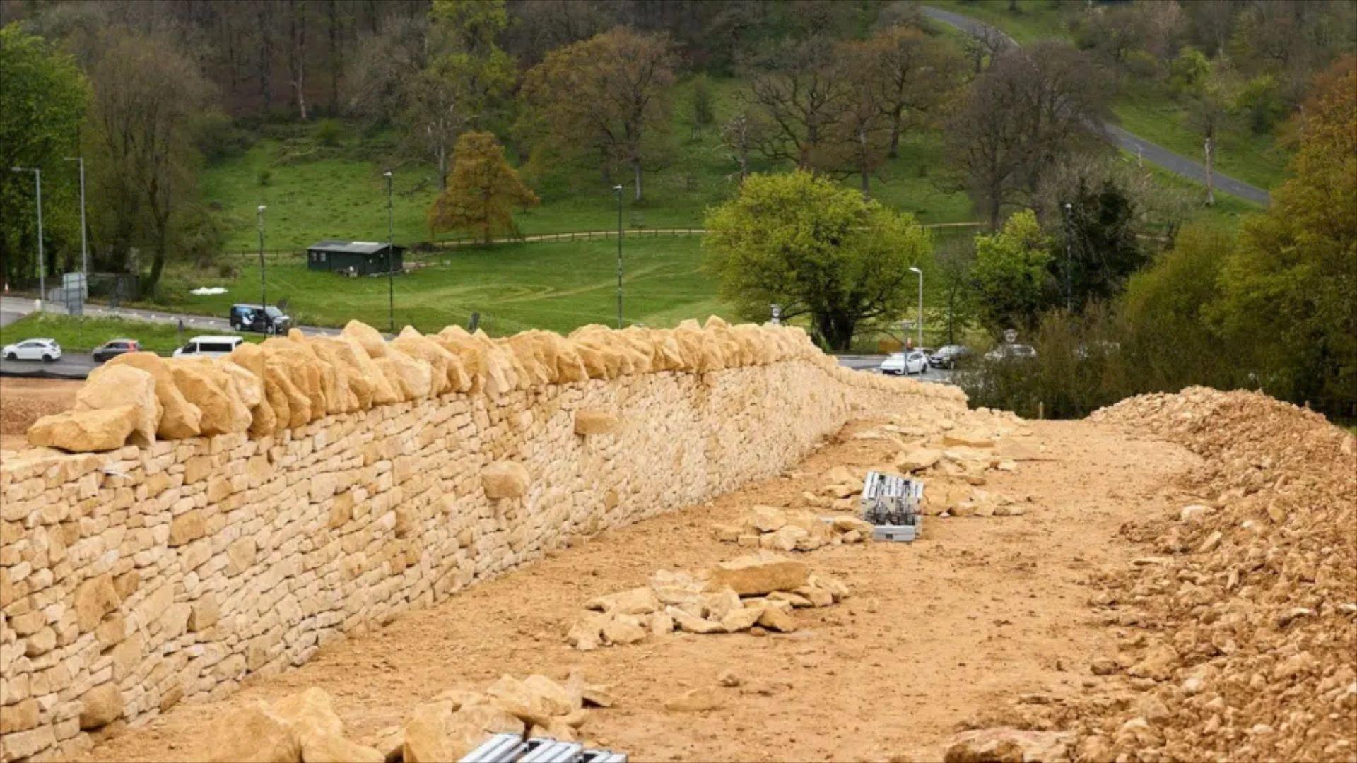 A stonewall being crafted along the A417