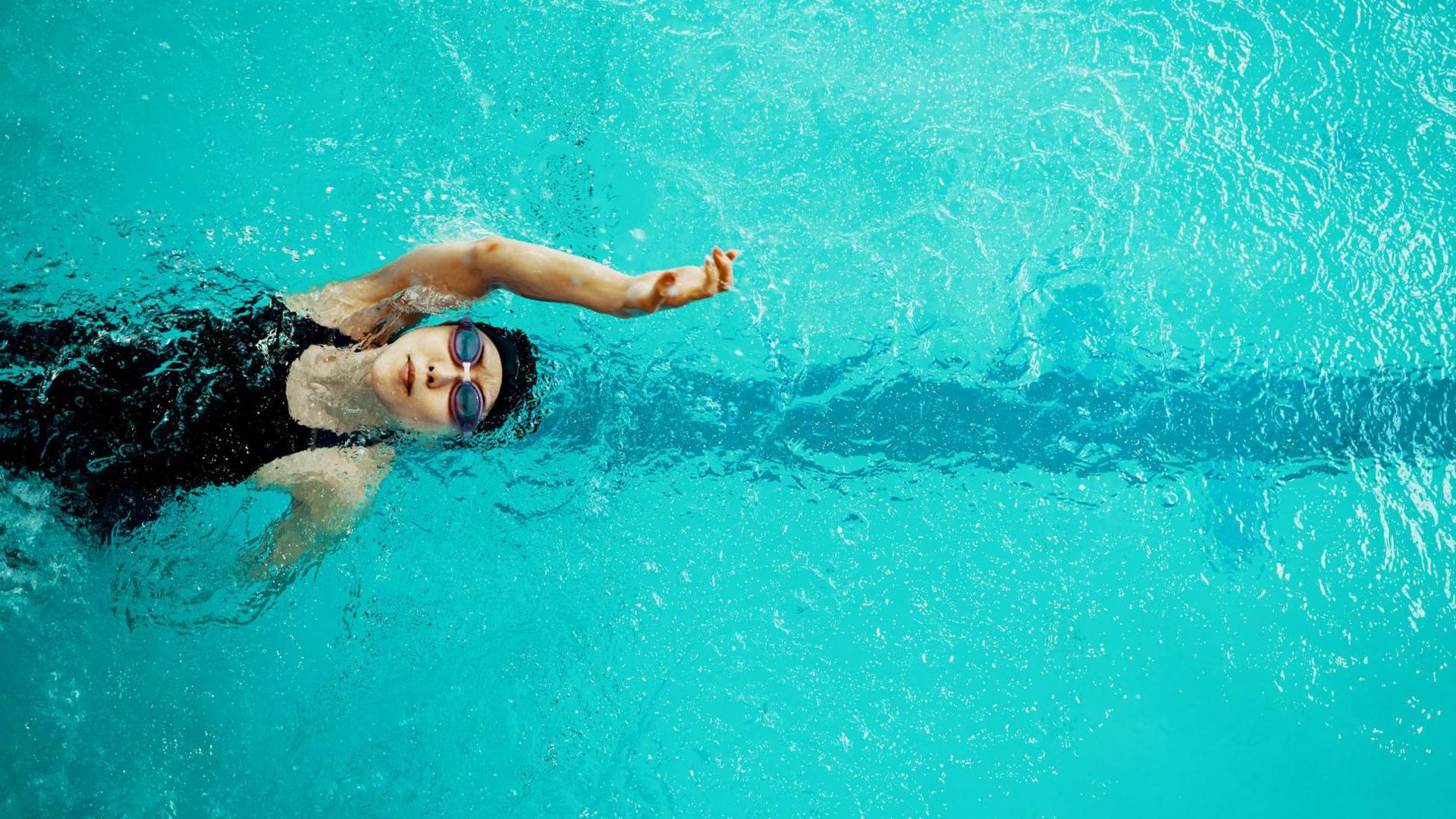 Swimmer in an indoor swimming pool