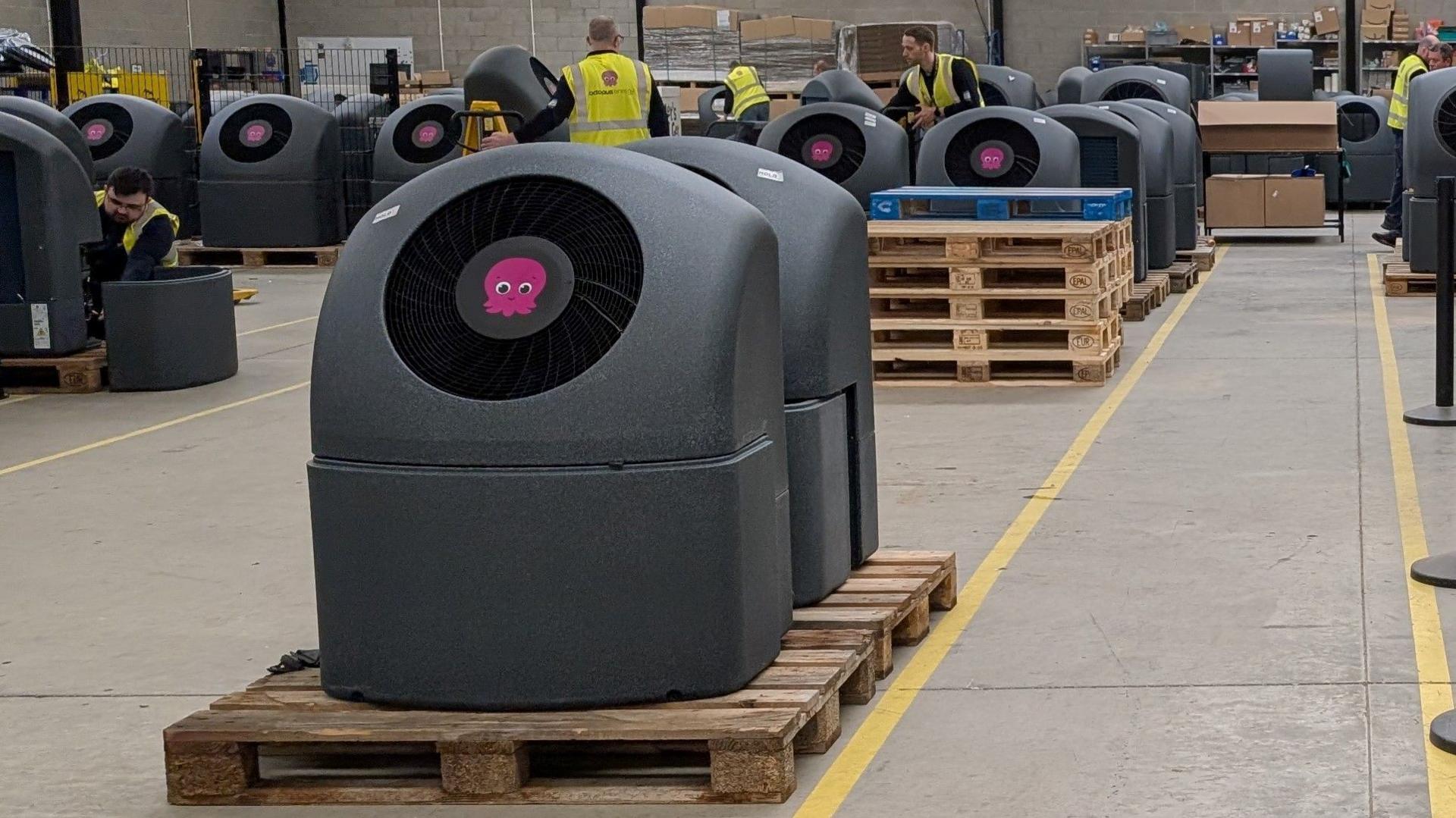 An Octopus heat pump; from the outside a large dark grey plastic box.