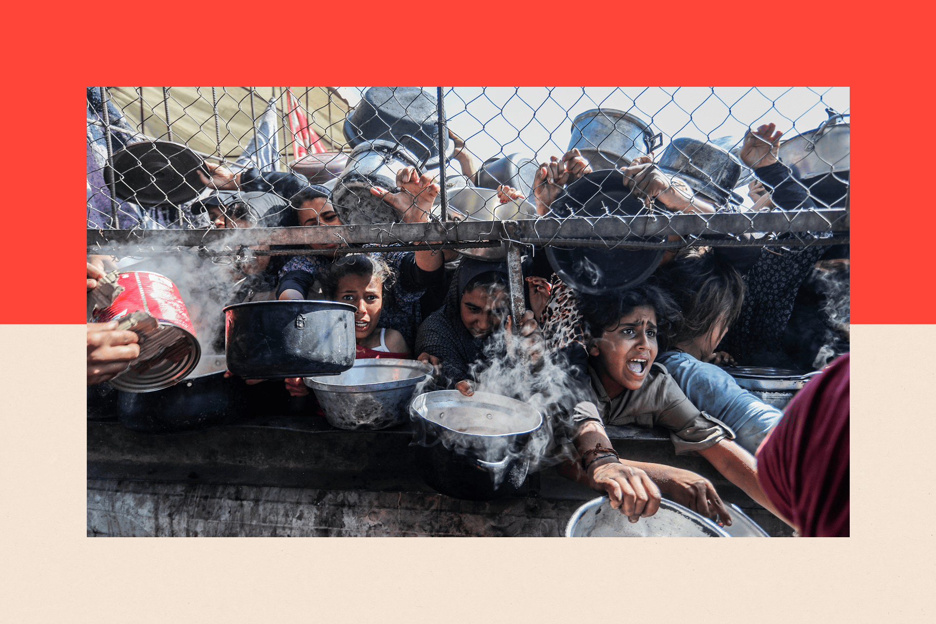 Displaced Palestinians receive food distributed by aid organisations