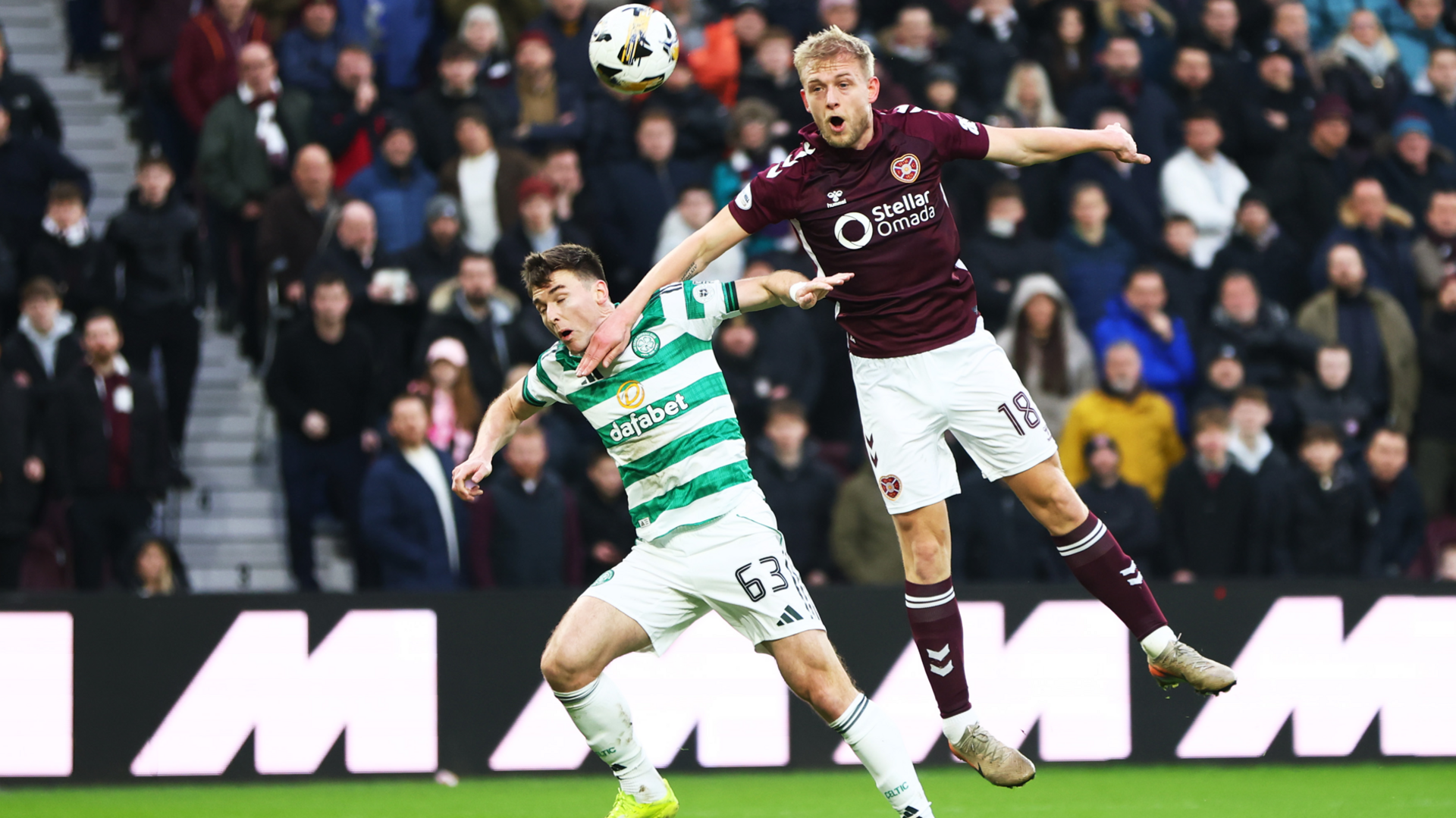 Harry Milne of Heart of Midlothian and Kieran Tierney of Celtic