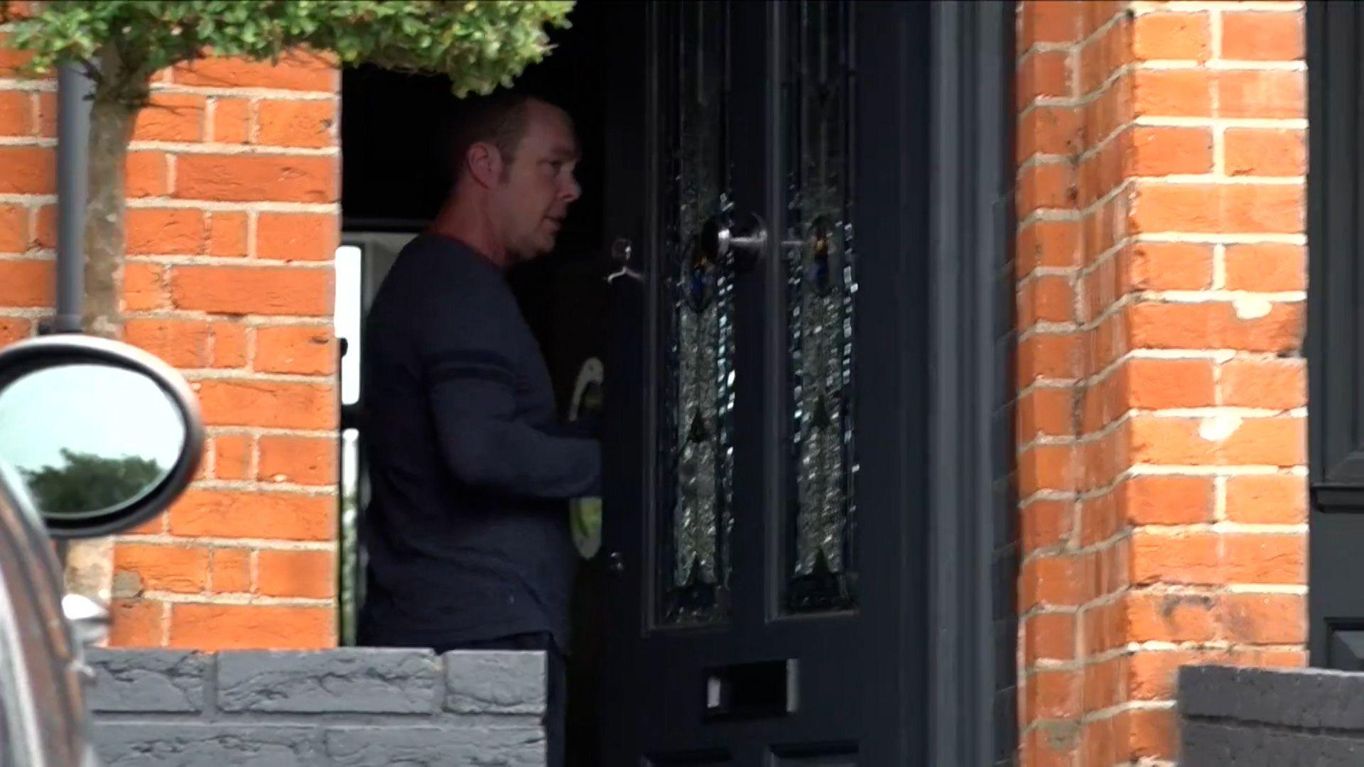 Morecambe owner Jason Whittingham enters his home