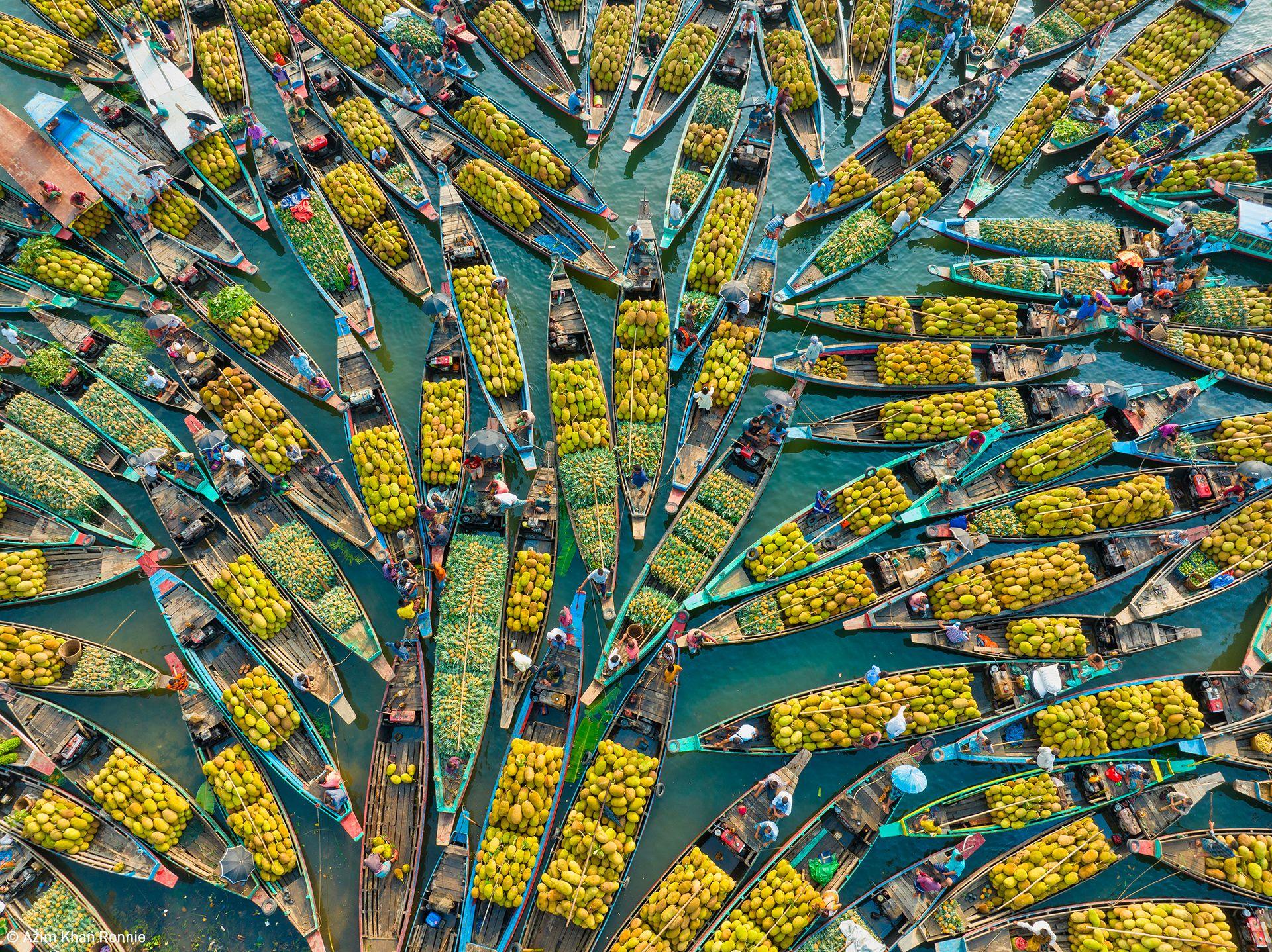 Early every morning in Rangamati, Bangladesh, boats selling fresh fruit create a floating market