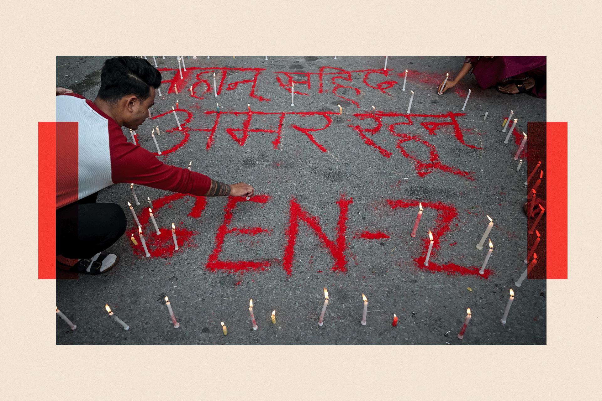  People light candles beside the words reading "Long live martyrs" during a silent tribute observing 'National Day of Mourning' in honour of those killed in clashes during recent protests