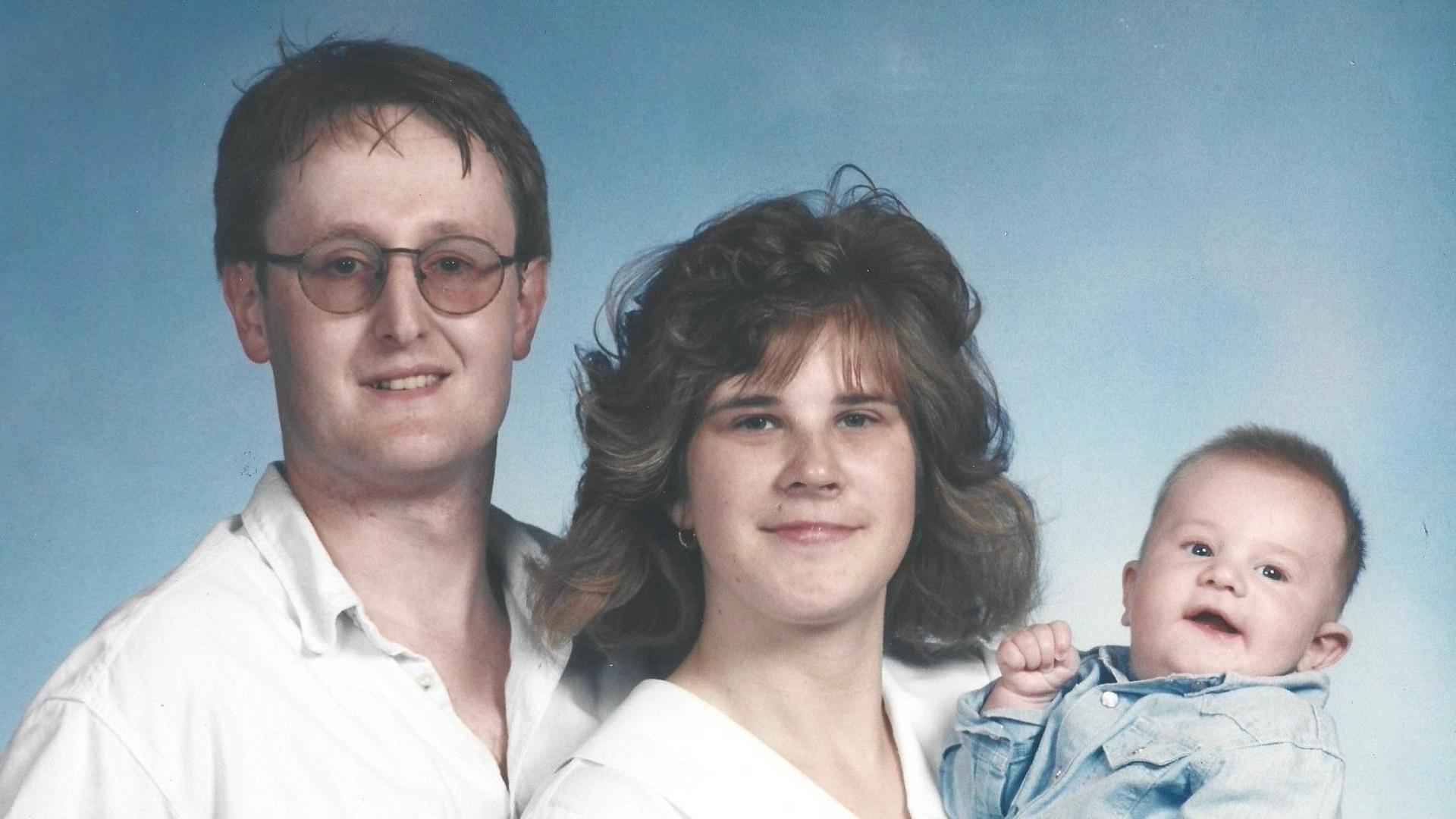 Gavin Usher with his wife and son