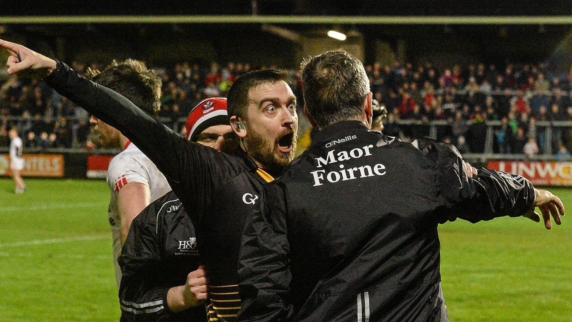 A match official sending off a manager