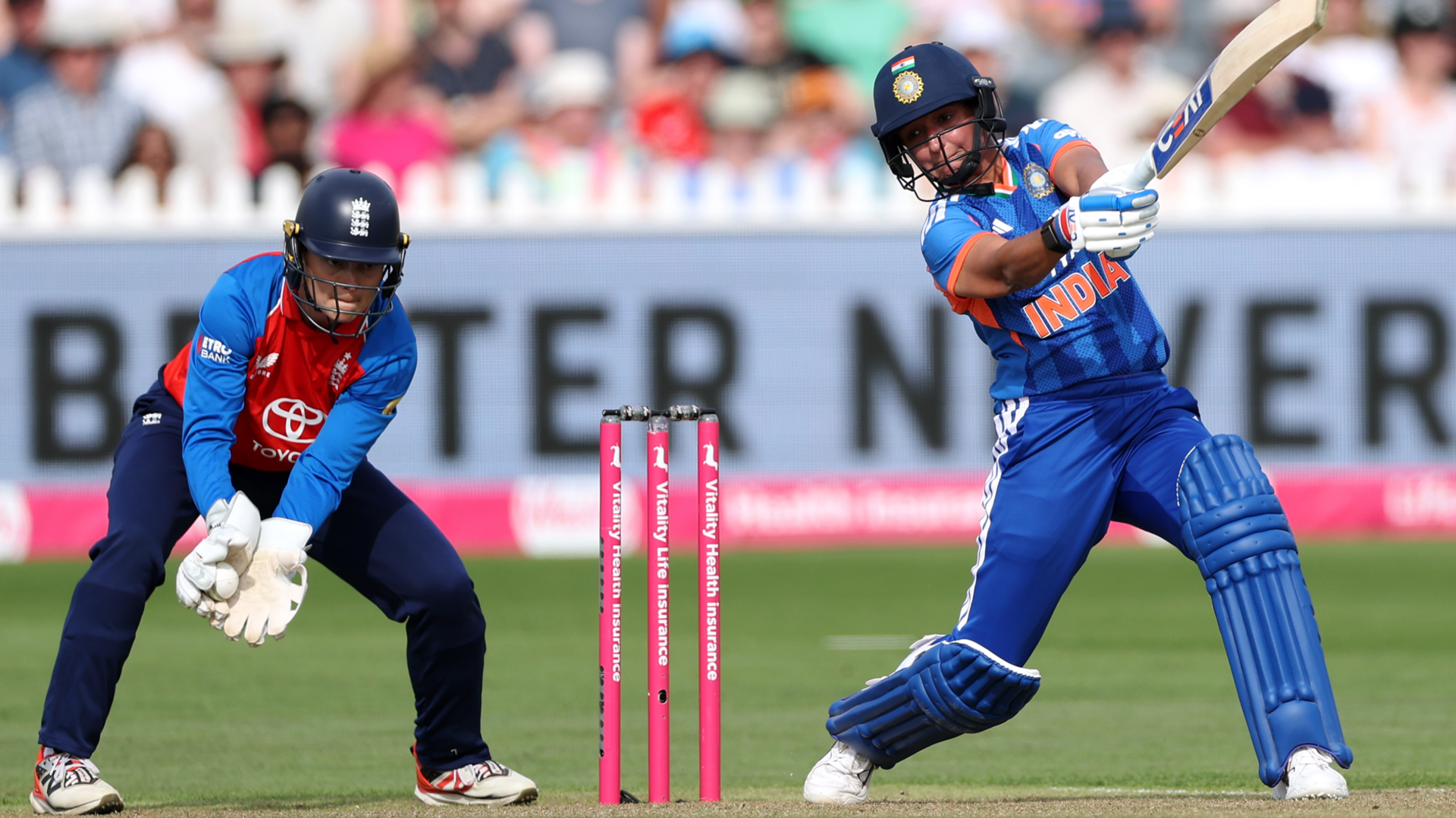 Amy Jones of England catches from Harmanpreet Kaur of India