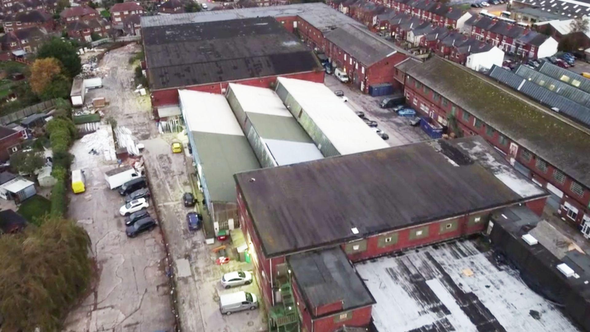 An aerial shot Botany Commercial Centre  which is made up of a series of warehouse buildings set among terraced housing