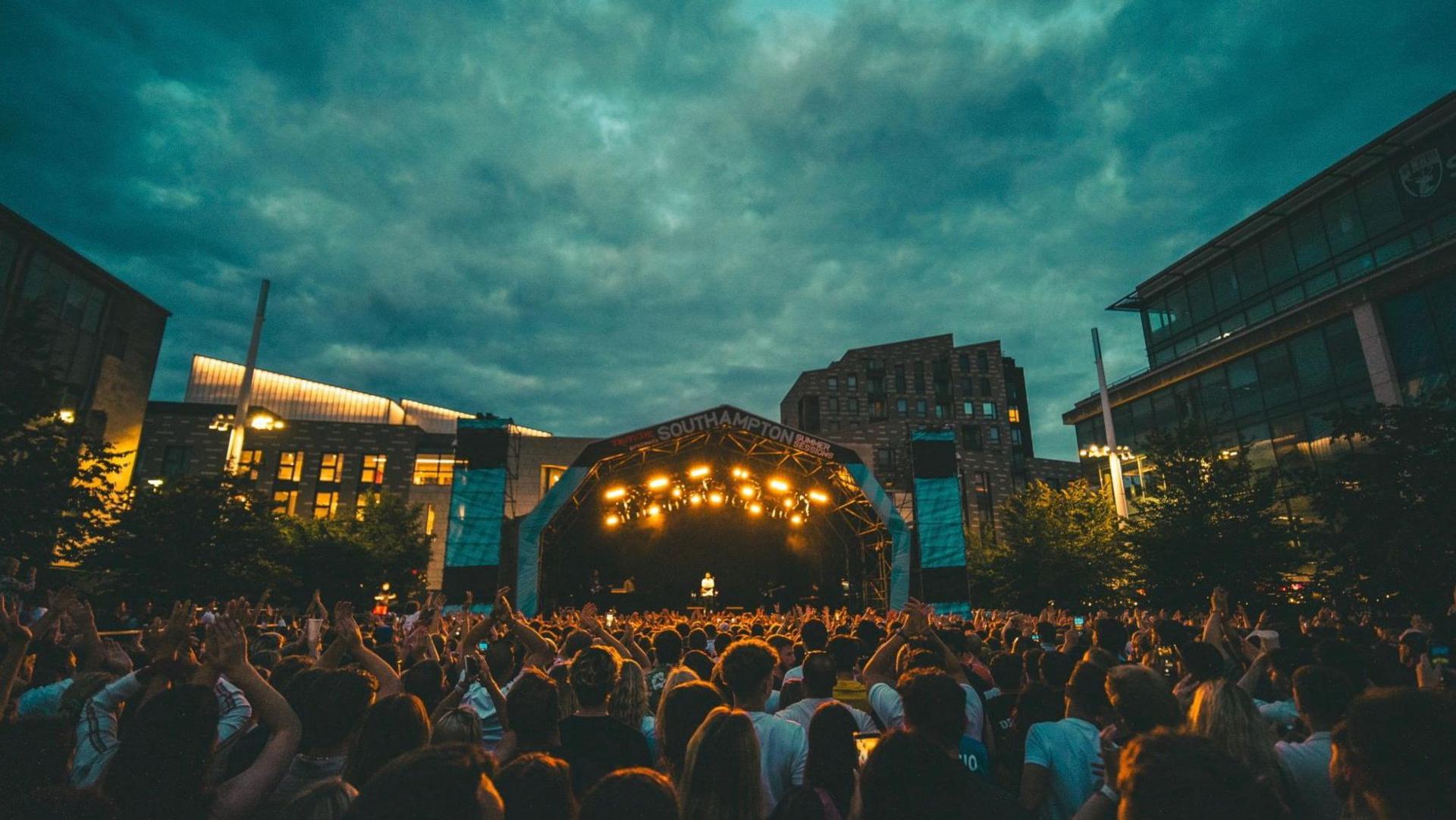 Crowds watching Loyle Carner on the stage