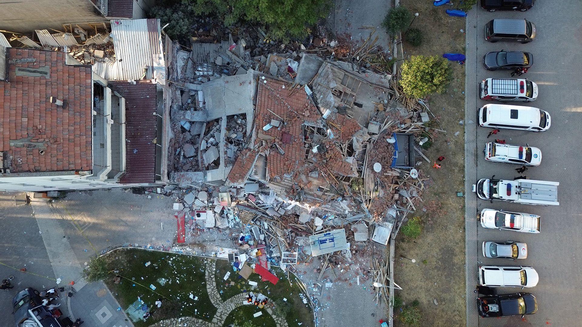 A drone view shows the site of a building that collapsed after an earthquake in Sindirgi in the western Balikesir province, Turkey