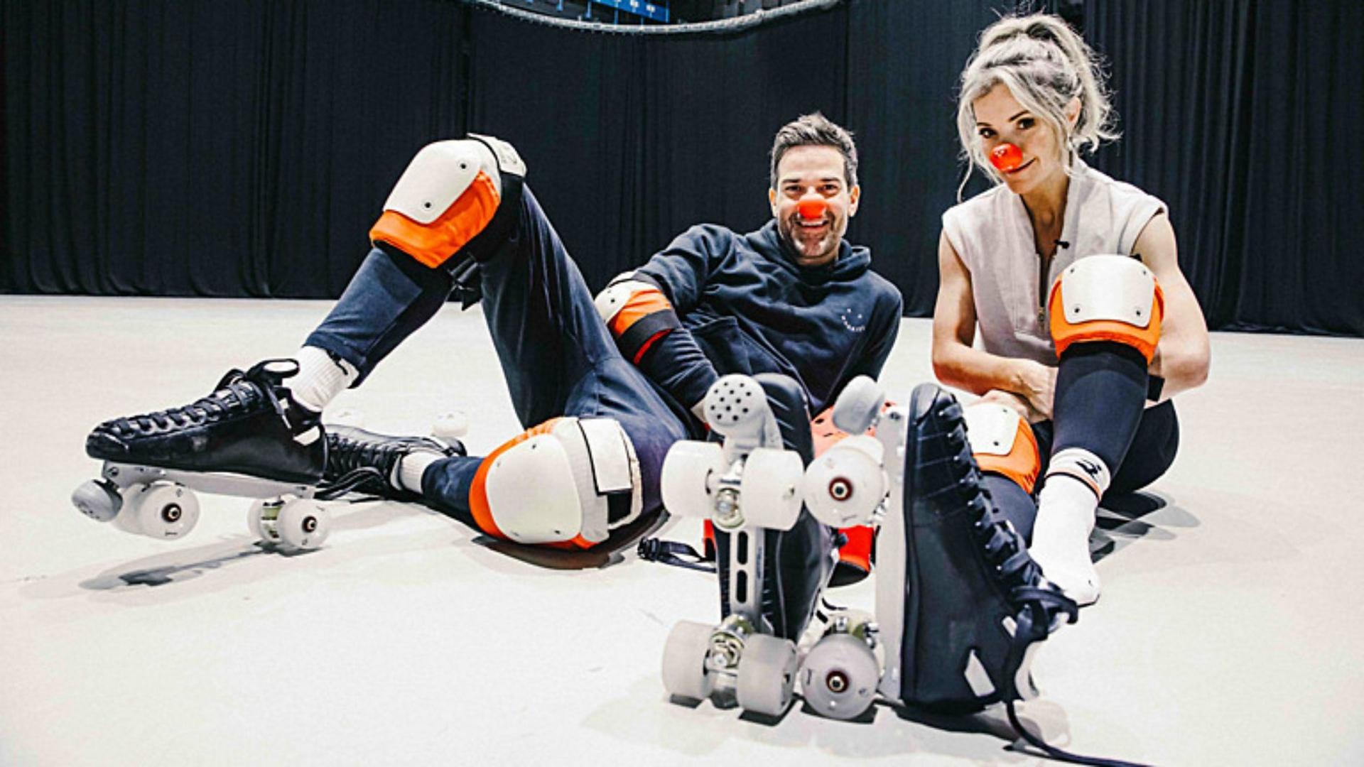 Gethin Jones and Helen Skelton in roller skates.