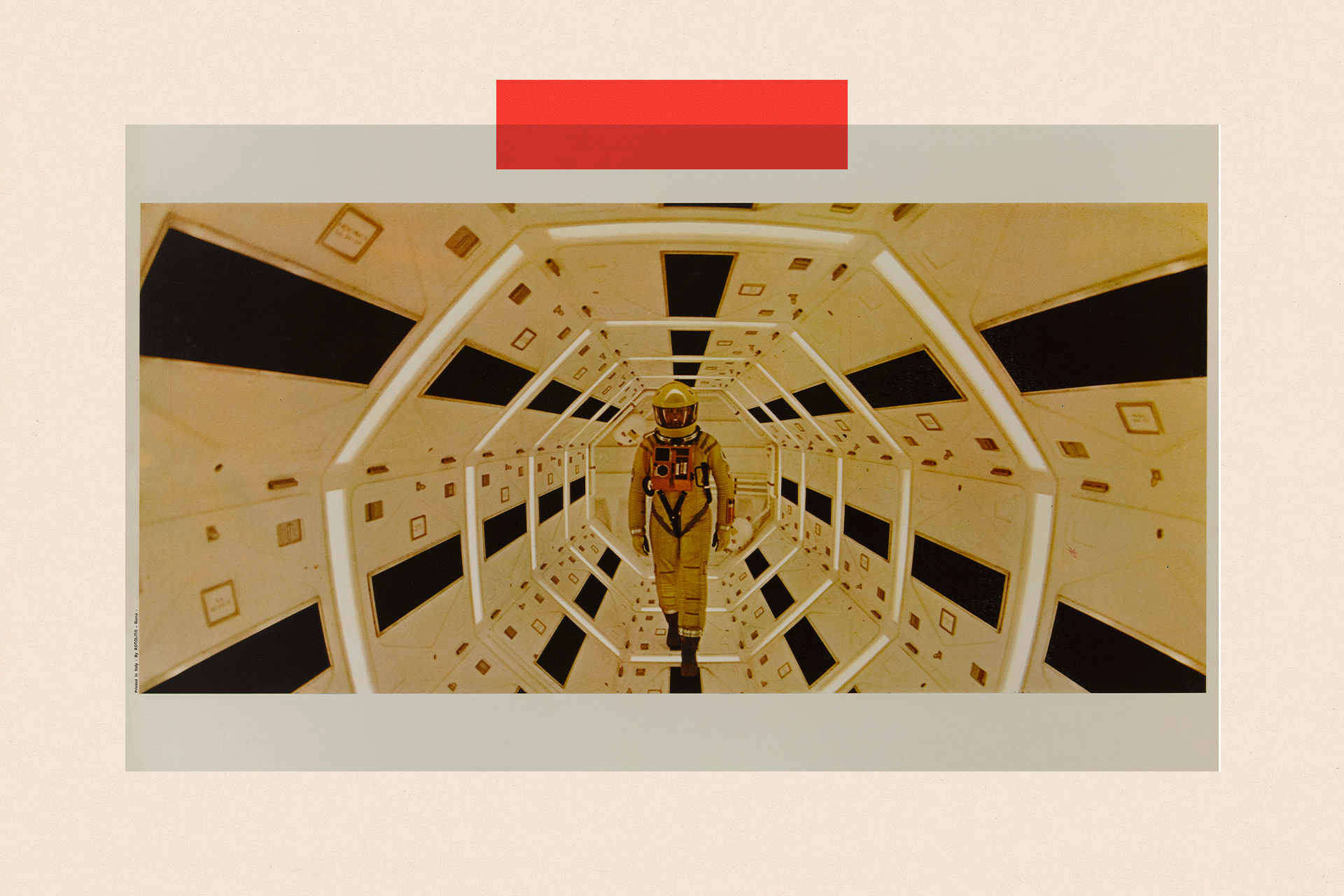 A still from the film 2001: A Space Odyssey, showing an astronaut walking along a corridor