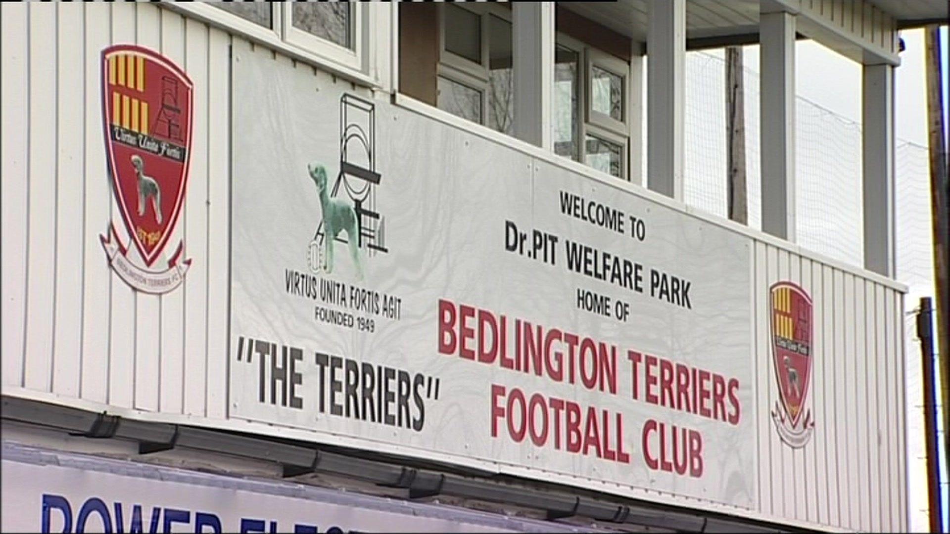 A sign across a clubhouse saying Welcome to Bedlington Terriers Football Club 