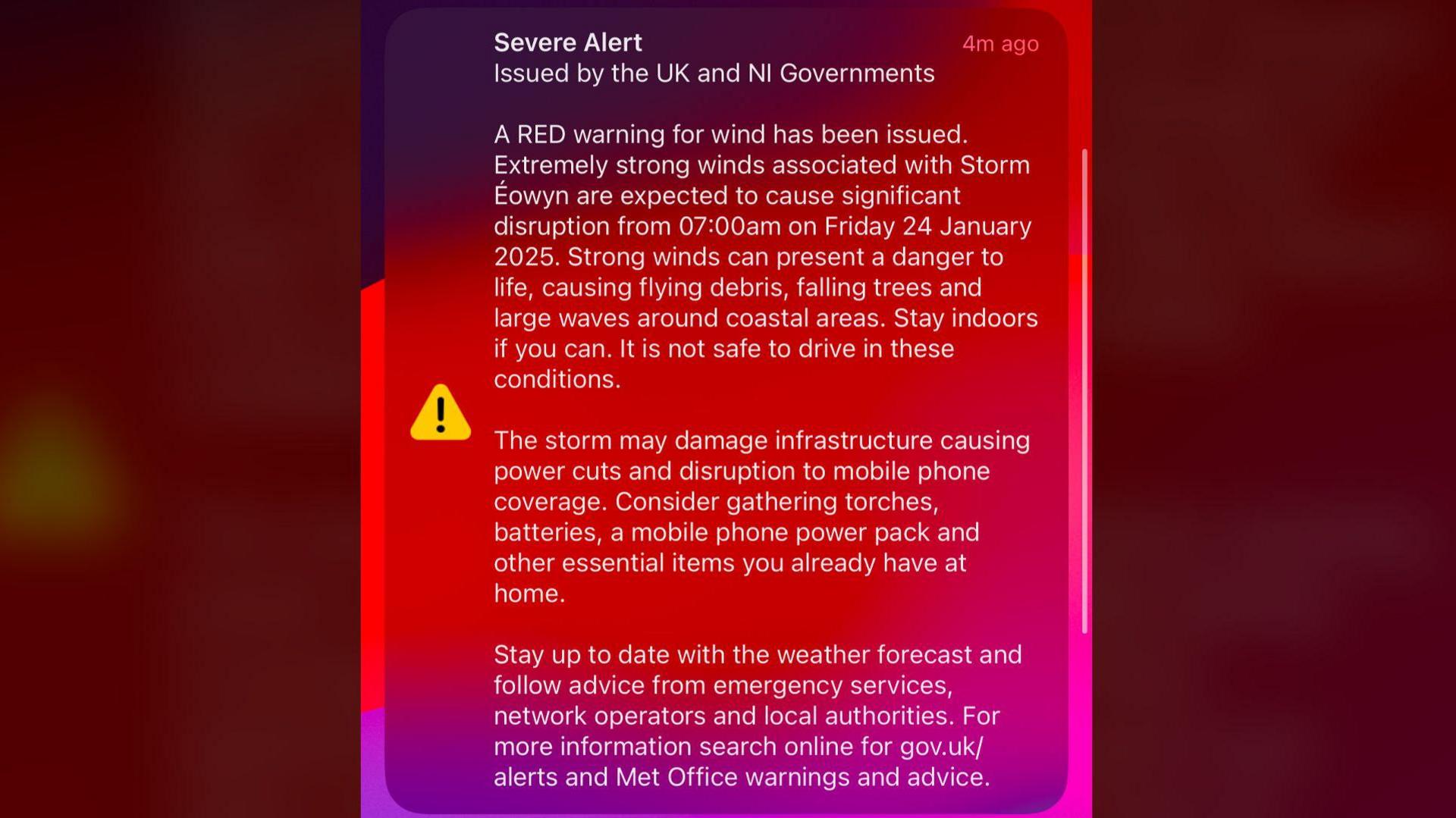 A notification screen on a mobile smart phone warning of a red weather warning for high winds in Northern Ireland on Friday. It reads: " A RED warning for wind has been issued. Extremely strong winds associated with Storm éowyn are expected to cause significant distruption from 07:00am on Friday 24 January 2025. Strong winds can present a danger to life, causing flying debris, falling trees and large waves around coastal areas. Stay infoors if you can. It is not safe to drive in these conditions.
