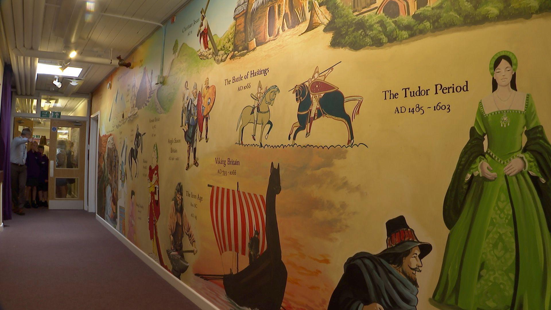 Mural depicting historic events at St Margaret's Academy, Torquay 