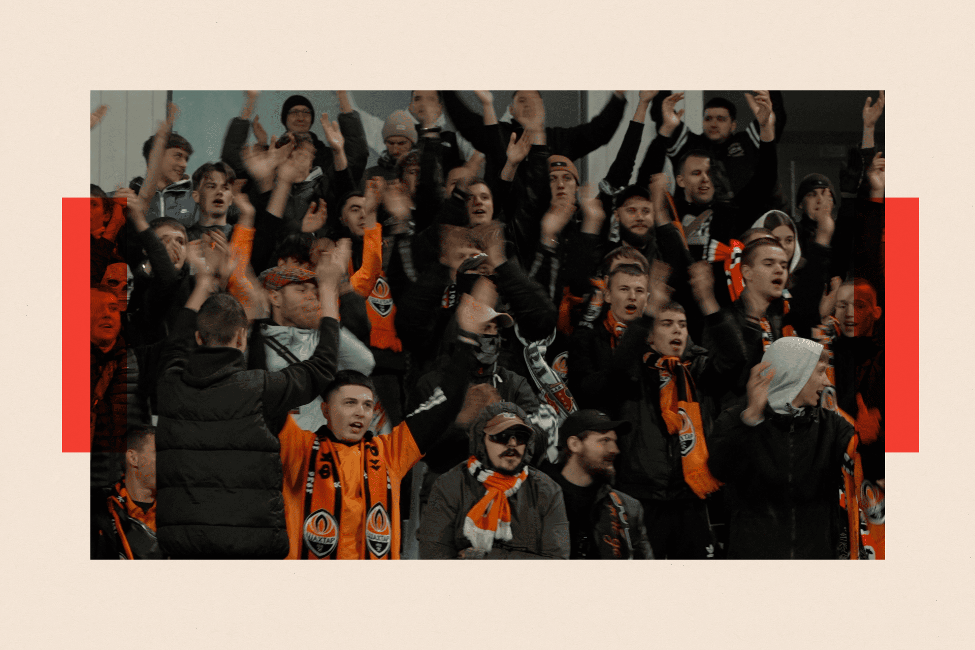 People cheering at the football game