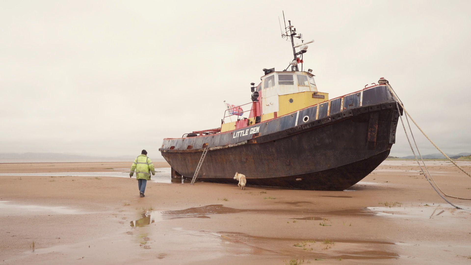 Davy Keenan walking towards his boat Little Gem