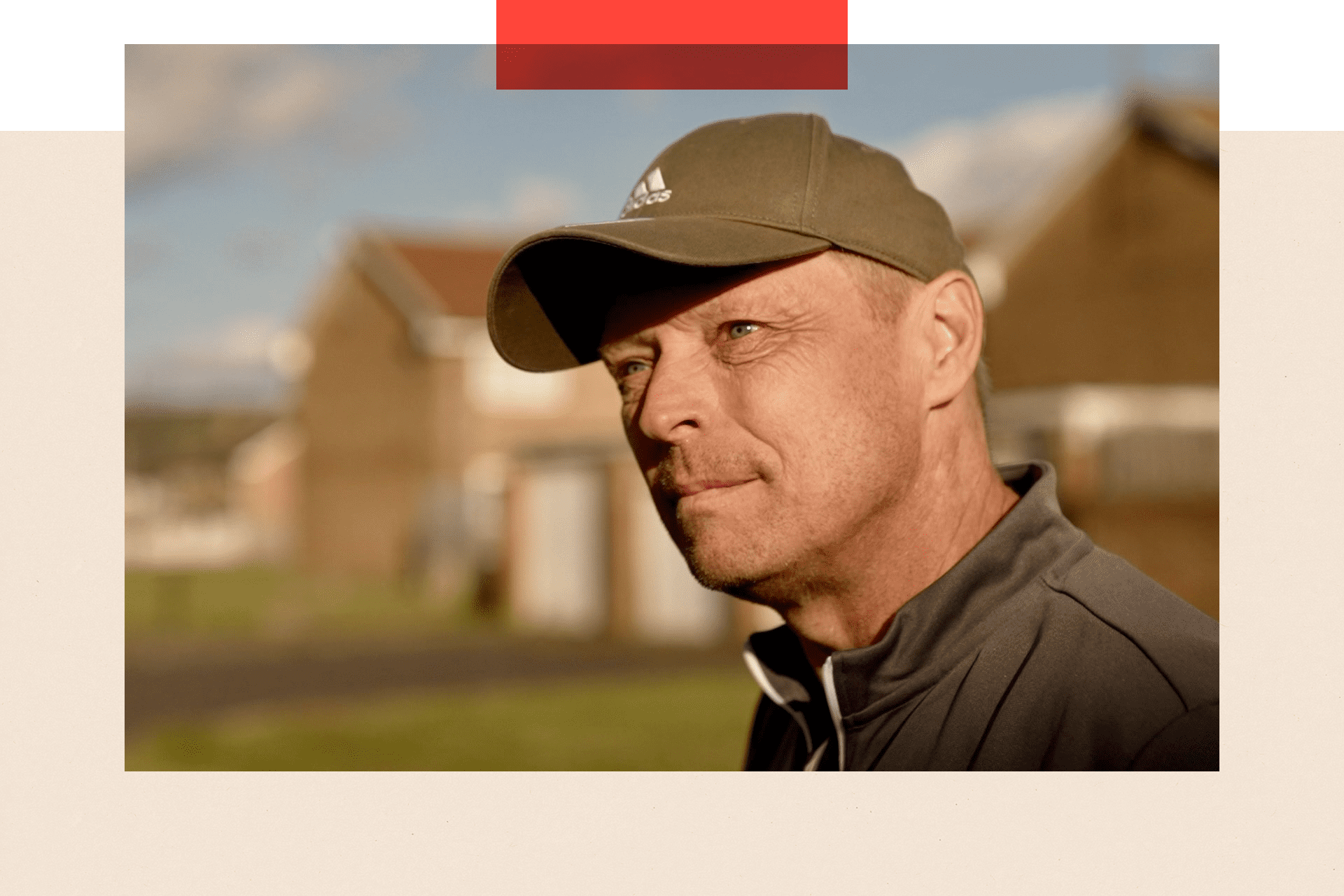 Close-up photo of Tony, a man with short hair in a baseball cap