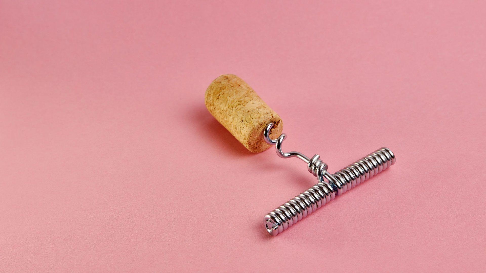 A cork screw with cork on it 