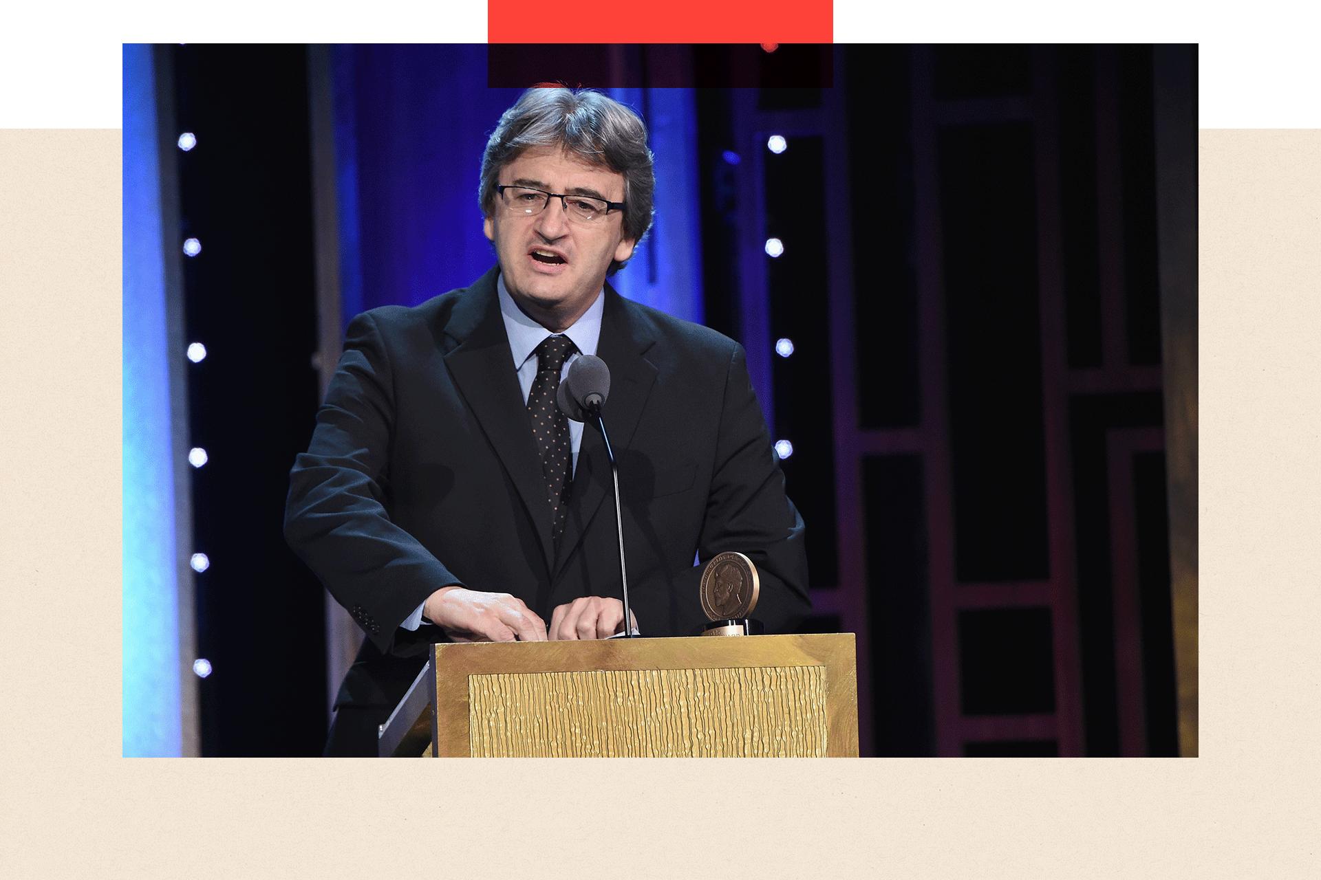 Fergal Keane speaks onstage at an awards ceremony 