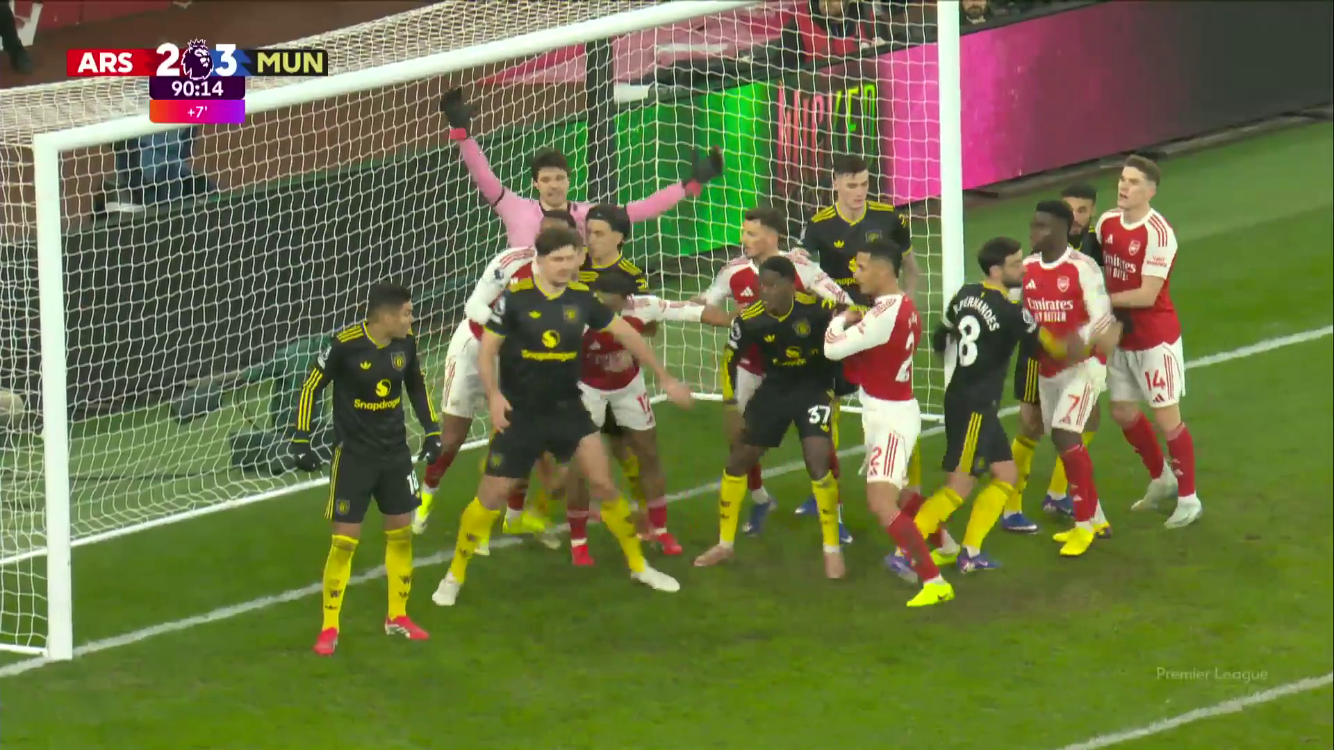 Image of numerous players in the six-yard box crowding Man Utd keeper Senne Lammens from an Arsenal attacking corner