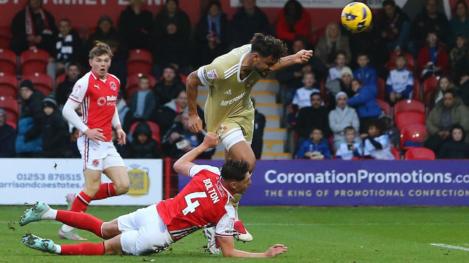 Ryan Tafazolli heads Swindon into the lead