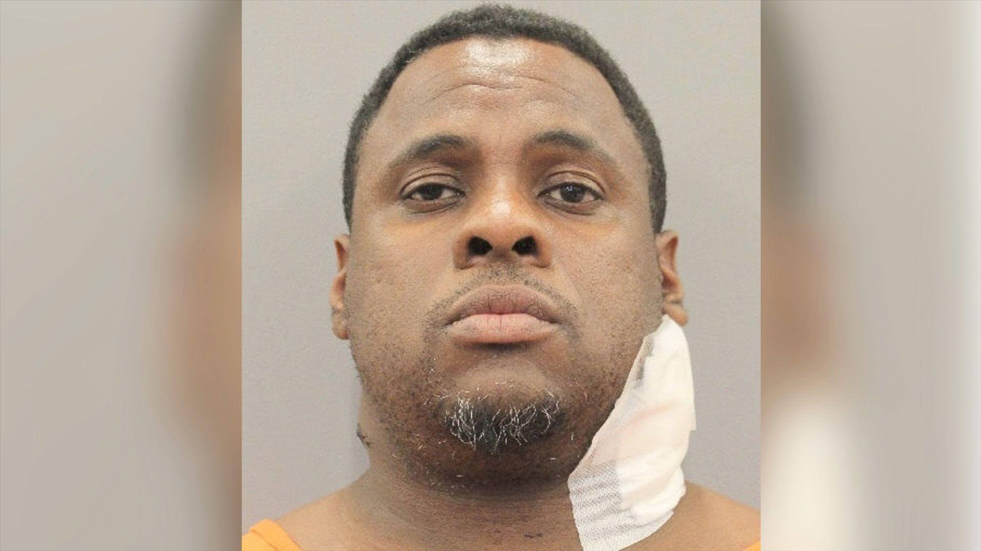 Chester Lamar Grant mugshot shows bandaged neck