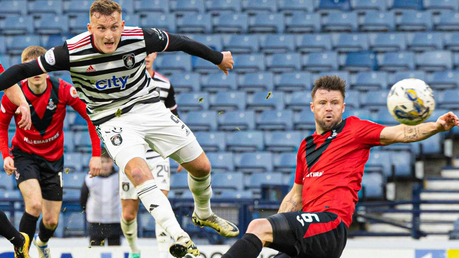 Queen's Park's Ruari Paton scores to make it 1-0 during a cinch Championship match between Queen's Park and Airdrieonians at Hampden Park