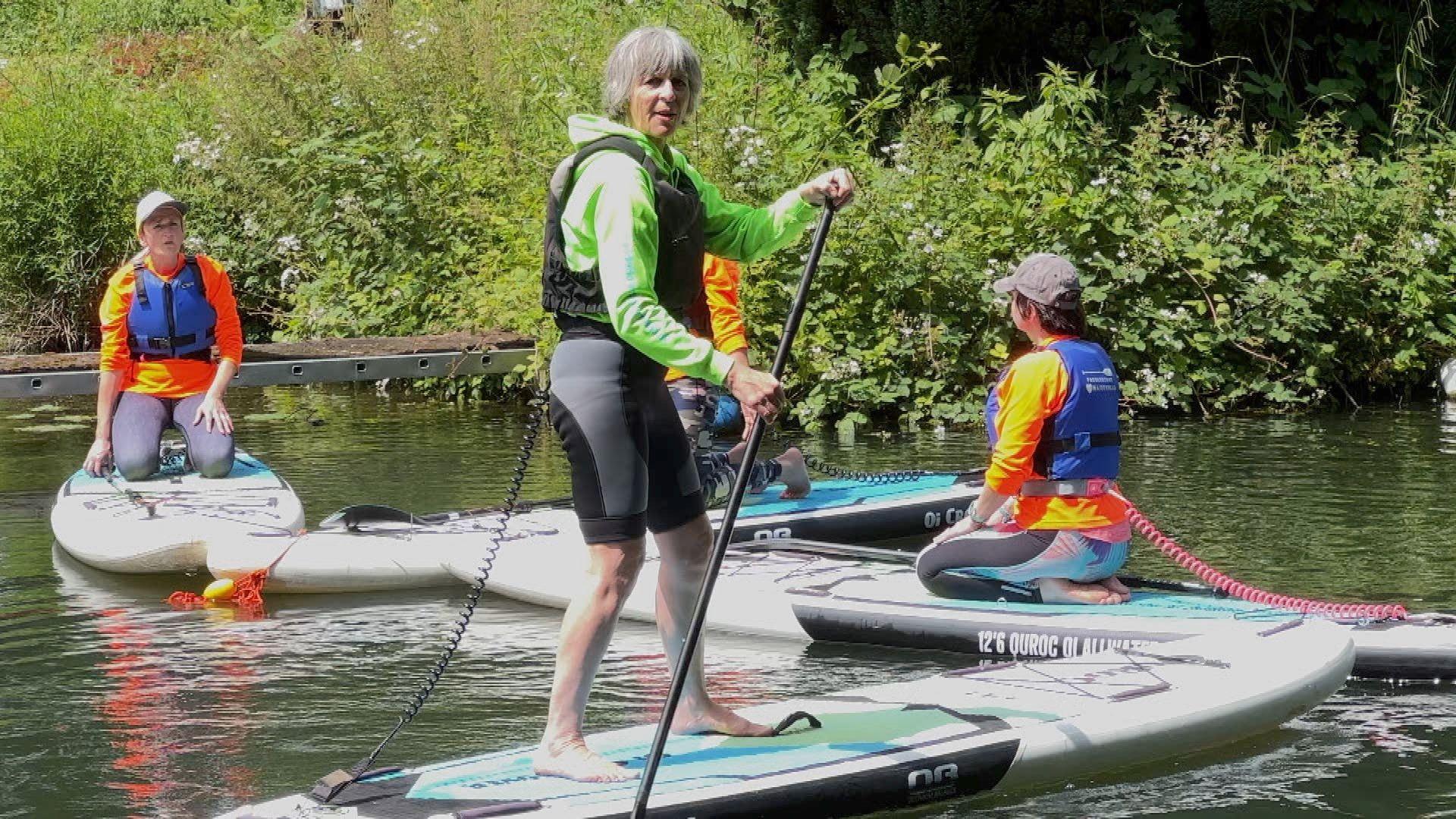 Tara Crist on paddle-board 