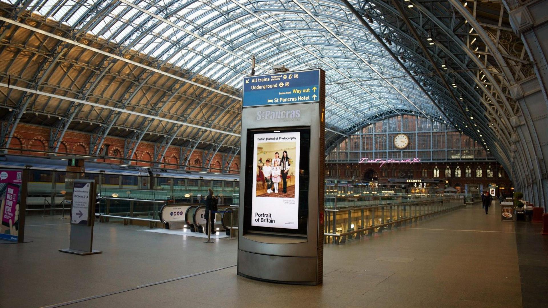 The portrait displayed on an electronic billboard in St Pancras railway station