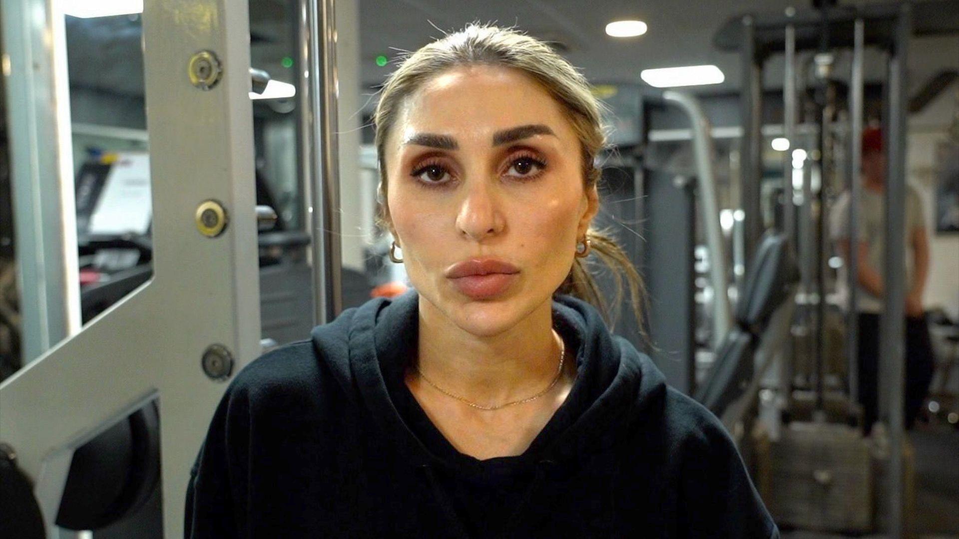 Roya Karimi in her gym, looking at camera