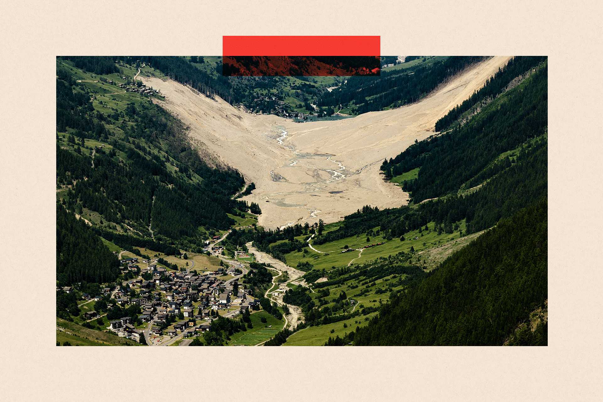 A valley showing a village but also devastation from where a glacier covered part of the village