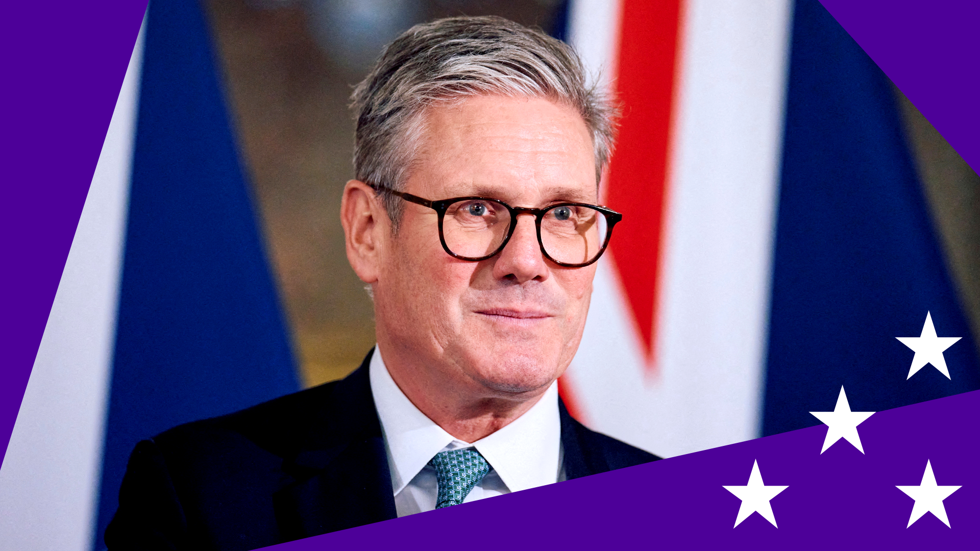 Sir Keir Starmer standing in front of a Union Jack with a jagged purple border with white stars