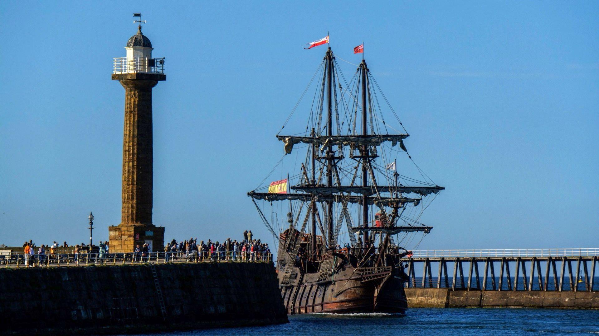 Spectators gathering as the ship arrives