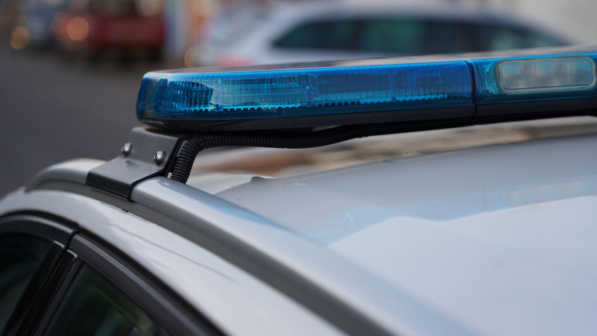 Blue lights on a police vehicle. Stock photo.
