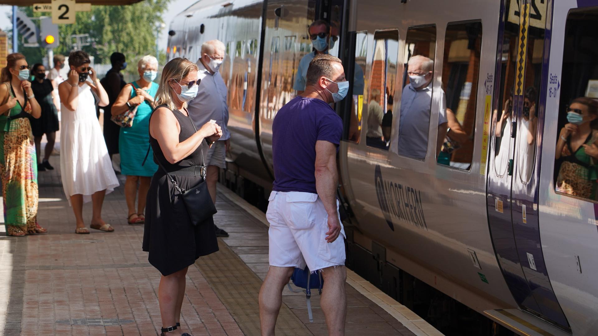 People getting on a train