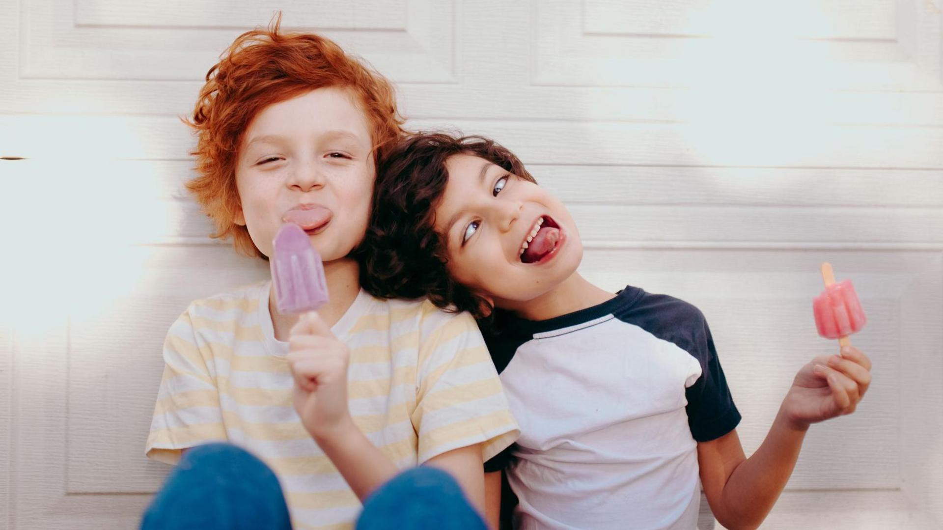 boys with ice lollies. 