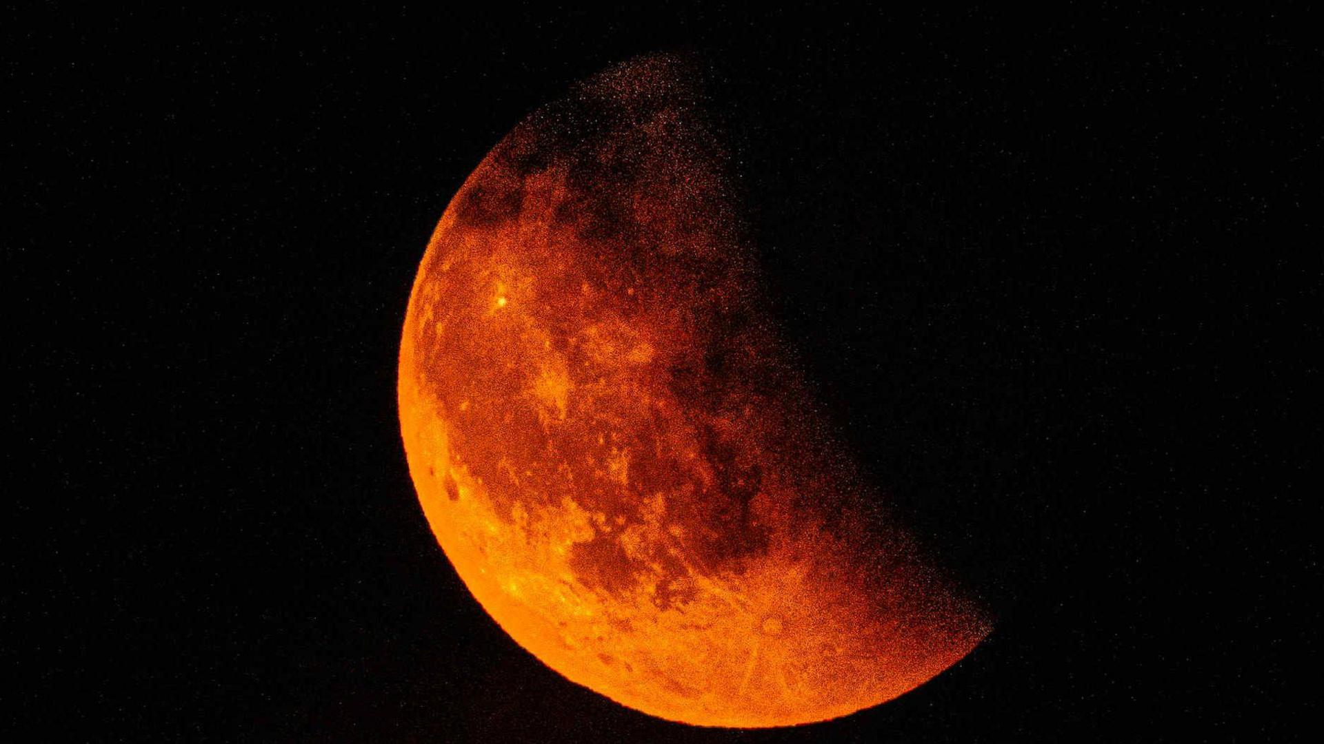 An image of the Moon captured during the lunar eclipse on 7 September when the Moon took on a red hue as it passed through Earth's shadow.