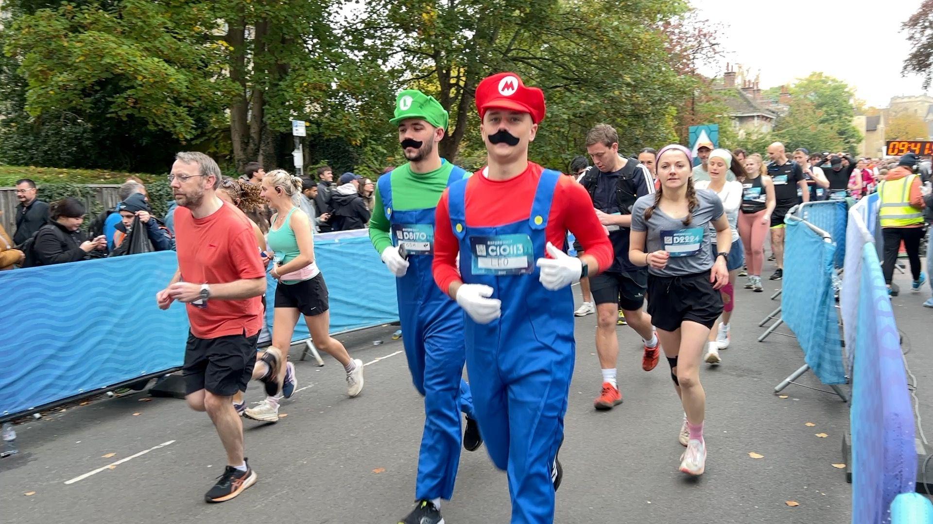 Two men dressed as Mario and Luigi run the Oxford Half.
