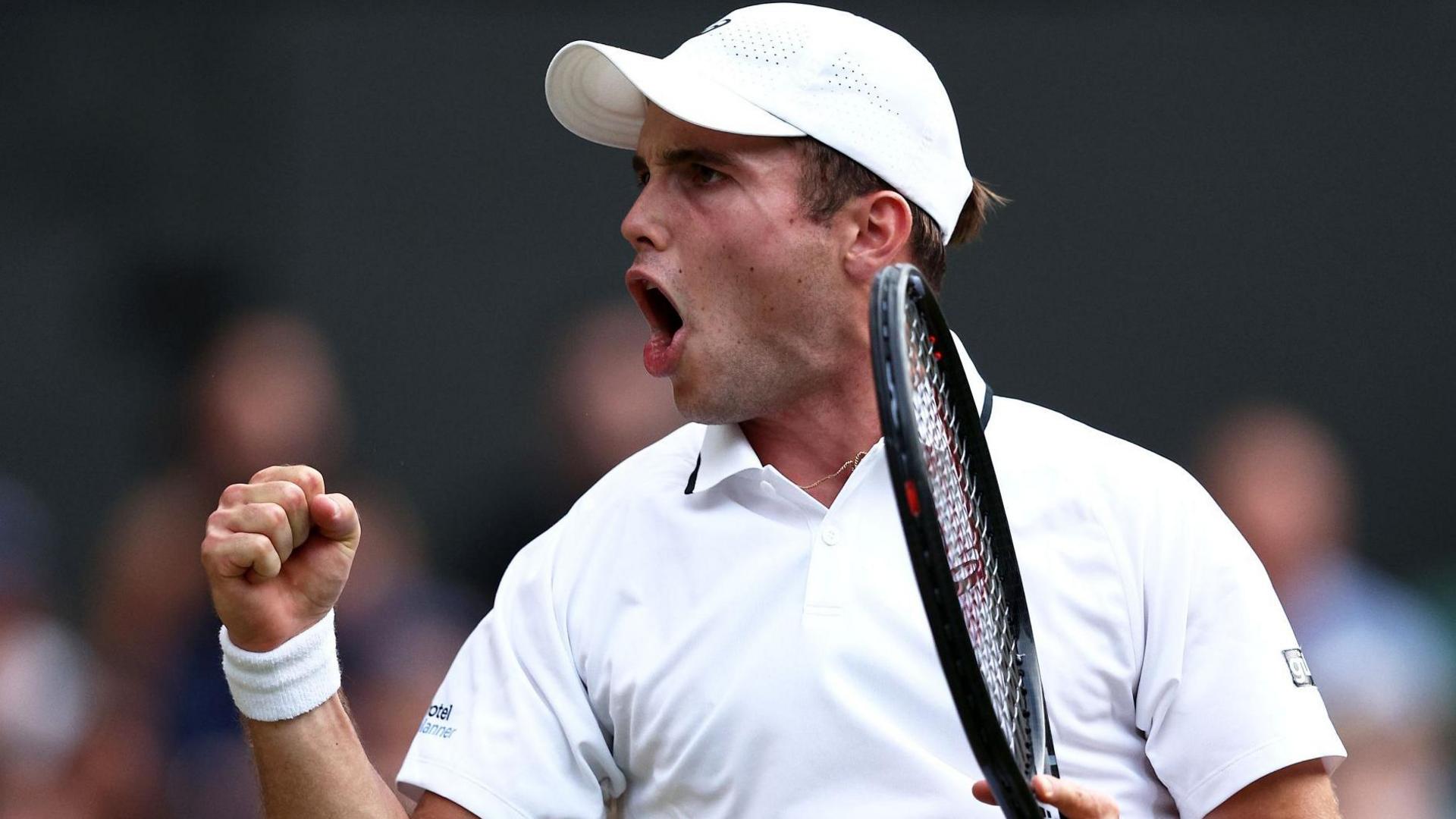 Arthur Fery celebrates his victory over Grigor Dimitrov