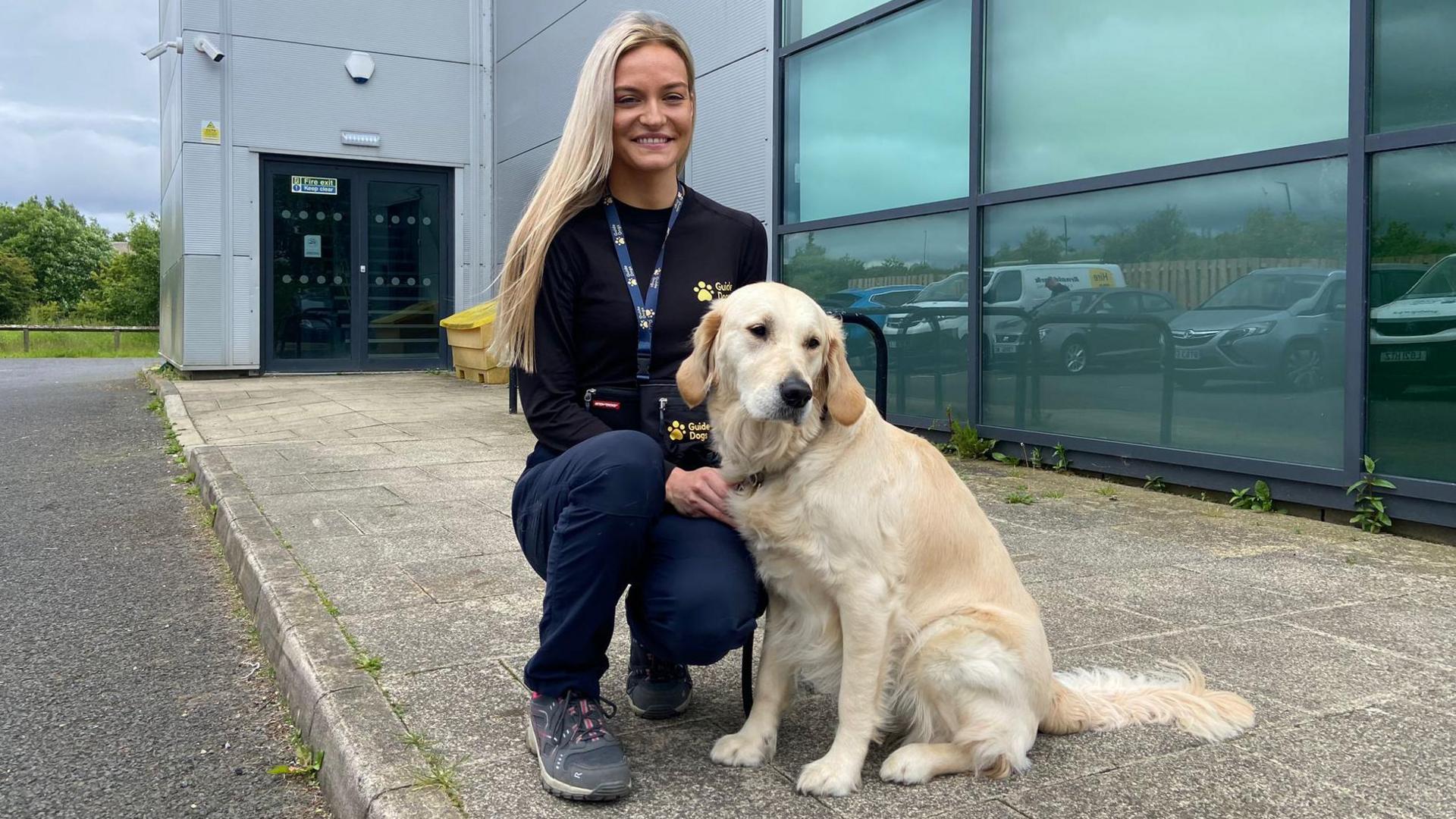 Esther the golden retriever with fosterer Ellie 