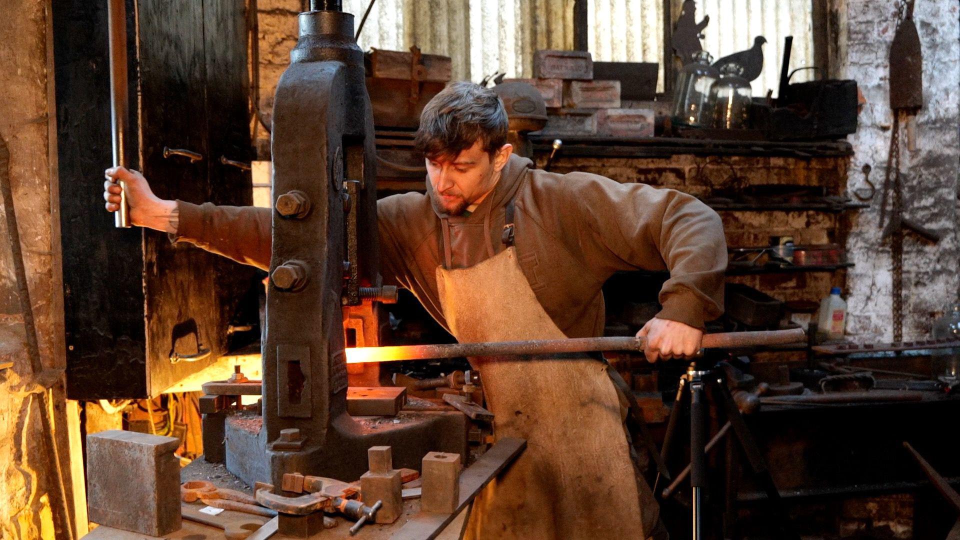 Jay Cardall at work as a blacksmith