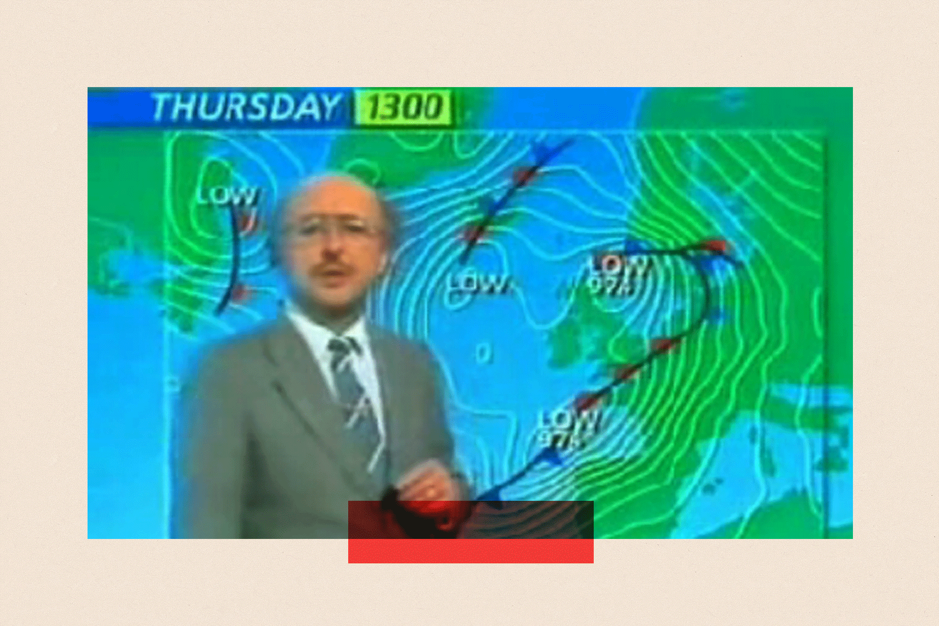 Fuzzy image of weatherman Michael Fish standing in front of the forecast