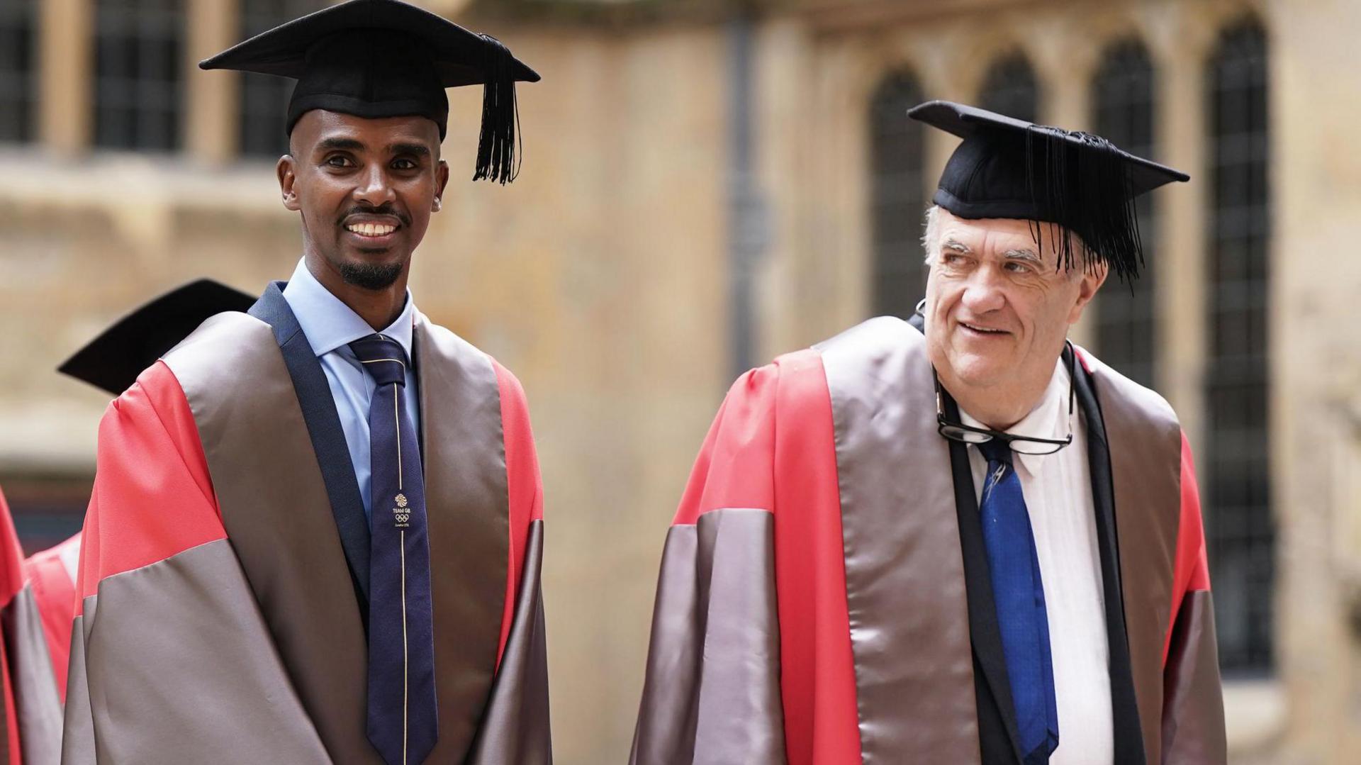 Sir Mo Farah and Colm Tóibín during the procession the the Sheldonian Theatre, ahead of Oxford University's annual Encaenia Ceremony where award honorary degrees will awarded.