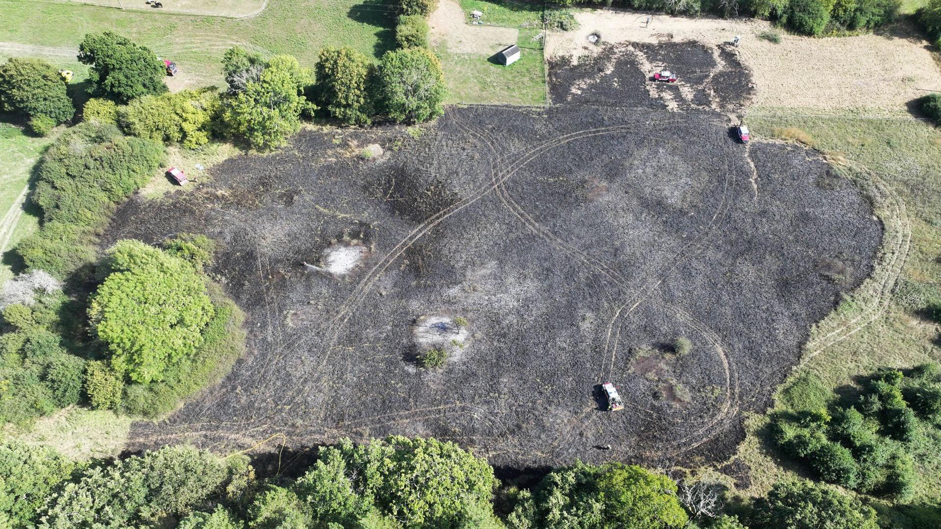 A large area of burnt land from above.