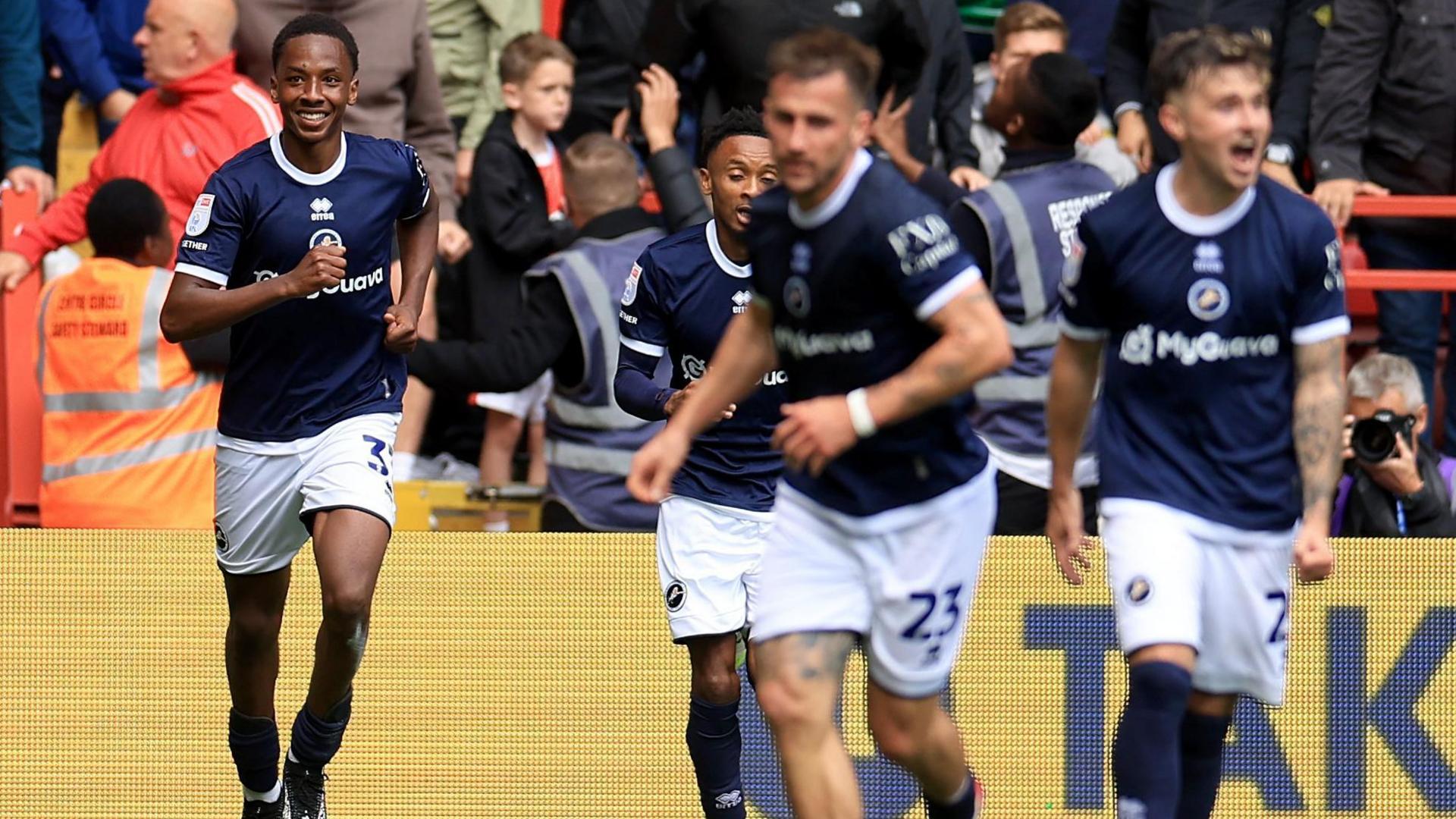Ra'ees Bangura-Williams celebrates with his Millwall teammates