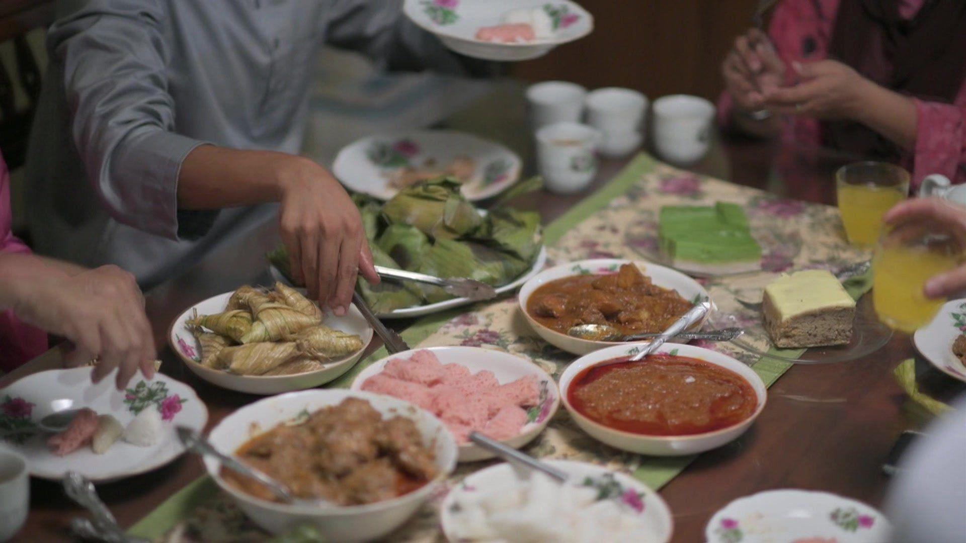 A family eating an Eid meal