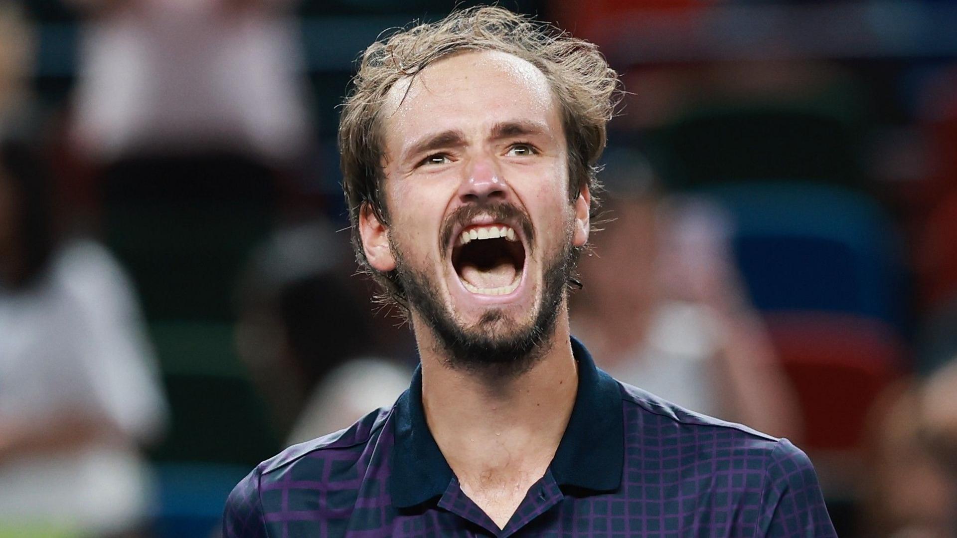 Daniil Medvedev yells in celebration