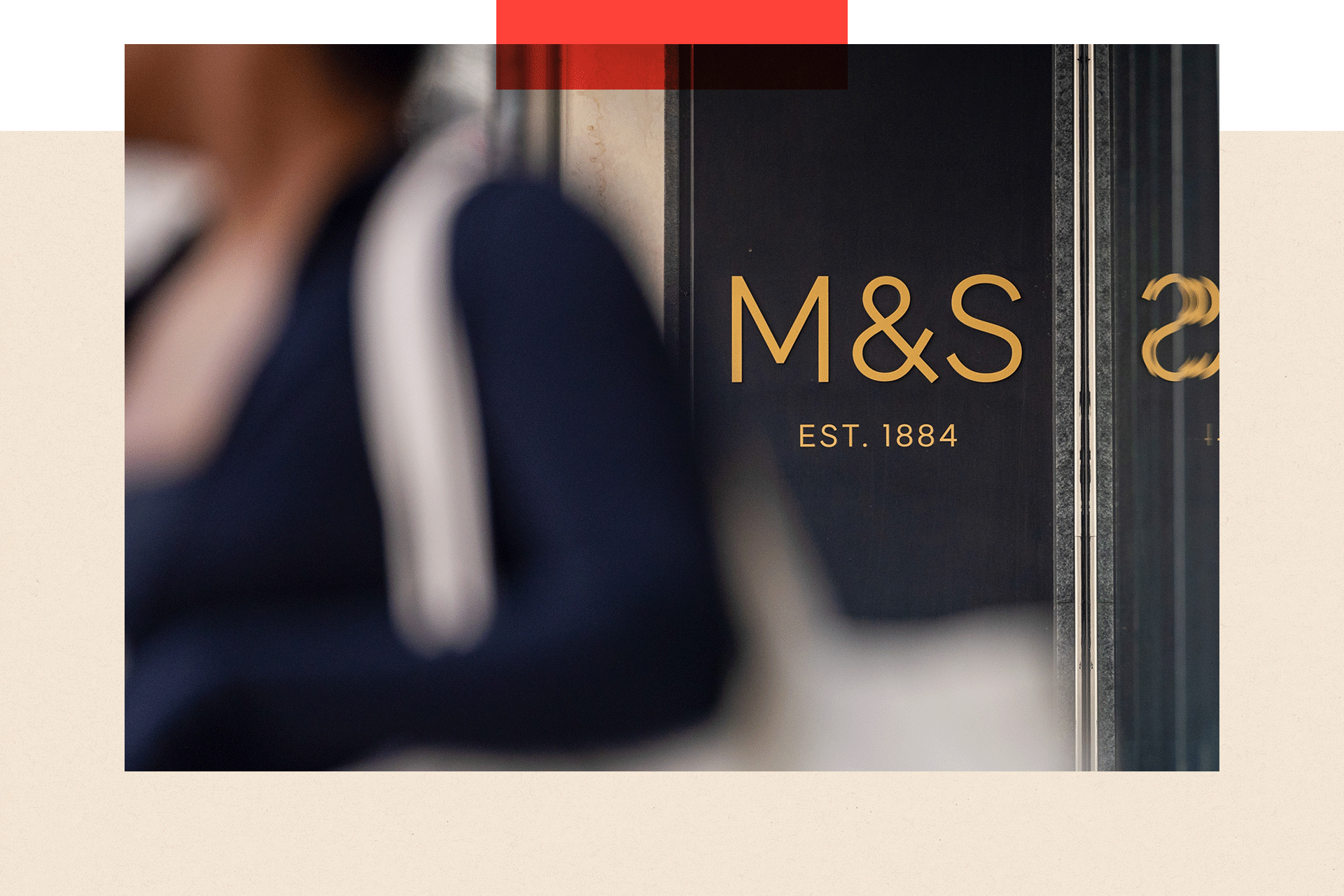A sign outside the entrance to a Marks & Spencer Group Plc (M&S) store on Oxford Street in London